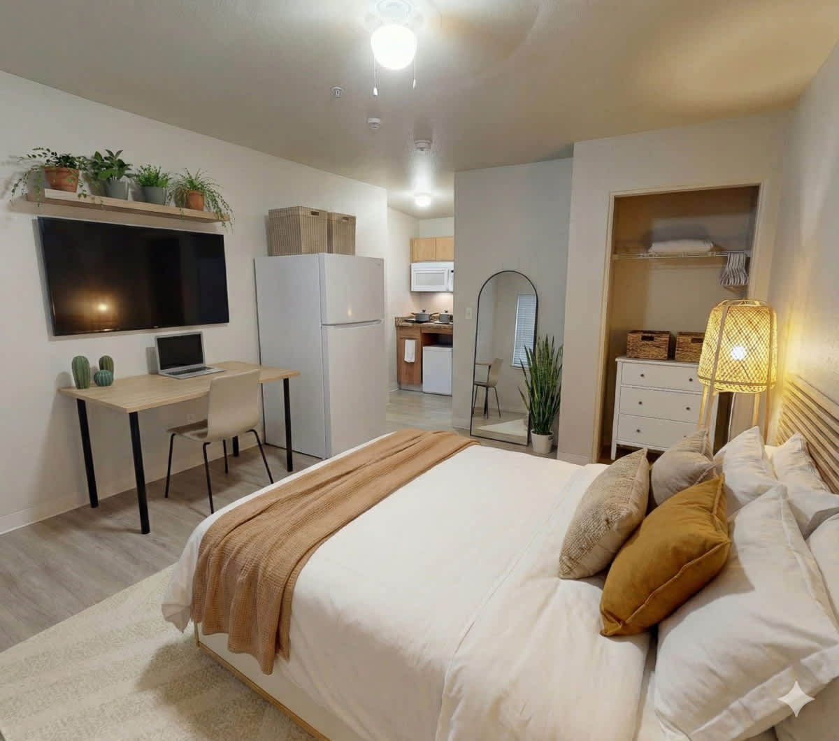 Cozy studio apartment with modern amenities, perfect for a relaxing stay. Enjoy the convenience of a full kitchen and workspace.