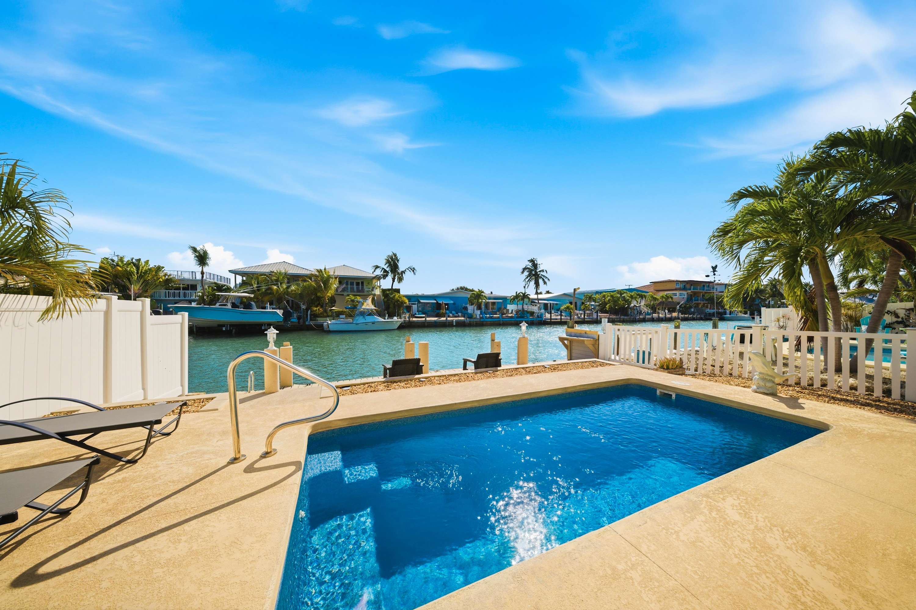 Sea Dreams on 9, 3 bedroom 3 bath 1/2 duplex, Private Pool in Key Colony Beach waterfront with 37 ft dockage and cabana club private membership, pool table and putting green.  — Key Colony Beach, FL — vacation rental