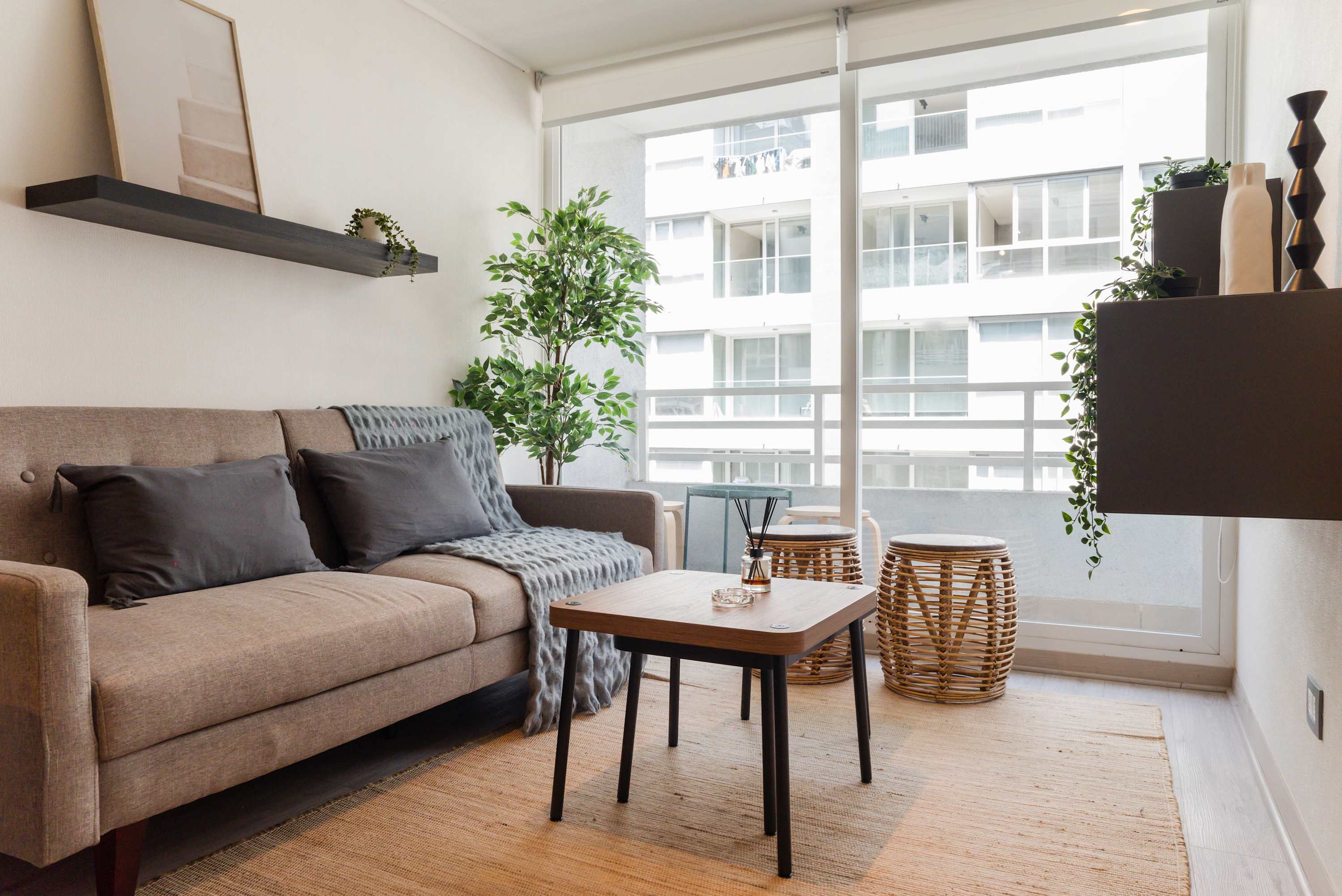 Relax in this cozy living area with a bright, airy ambiance and stylish decor, perfect for unwinding after exploring the city.