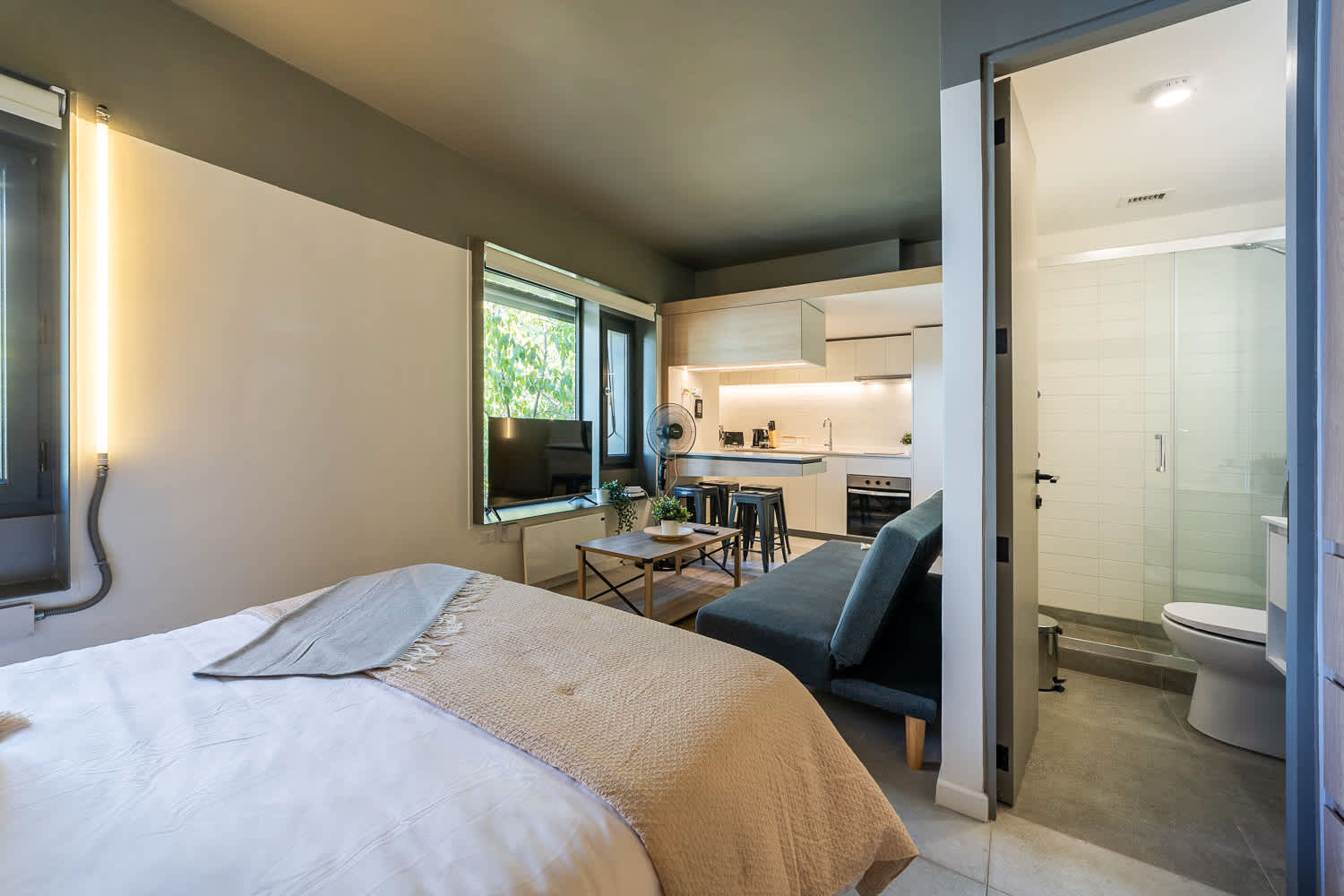 Cozy studio with modern amenities and a sleek design, perfect for a comfortable stay in the heart of the city.