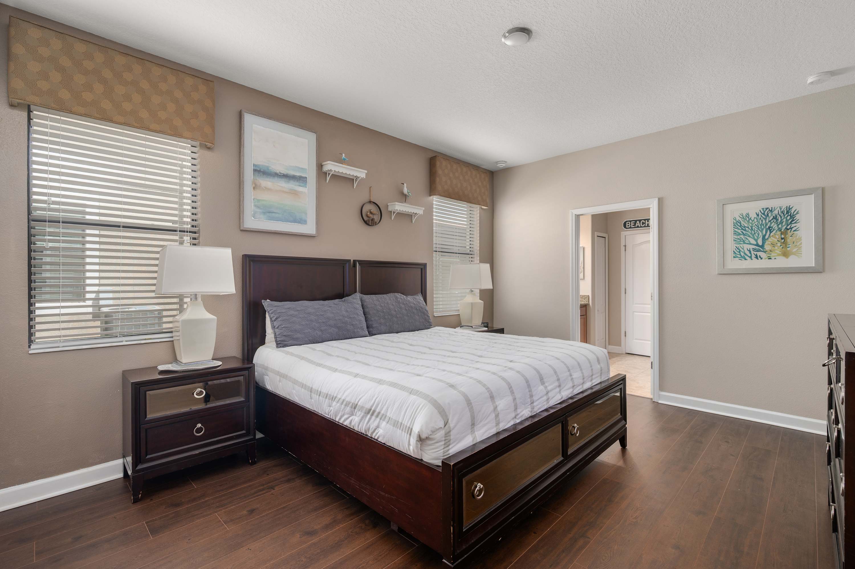 Bright bedroom w/ large windows, TV & plenty of space to relax
