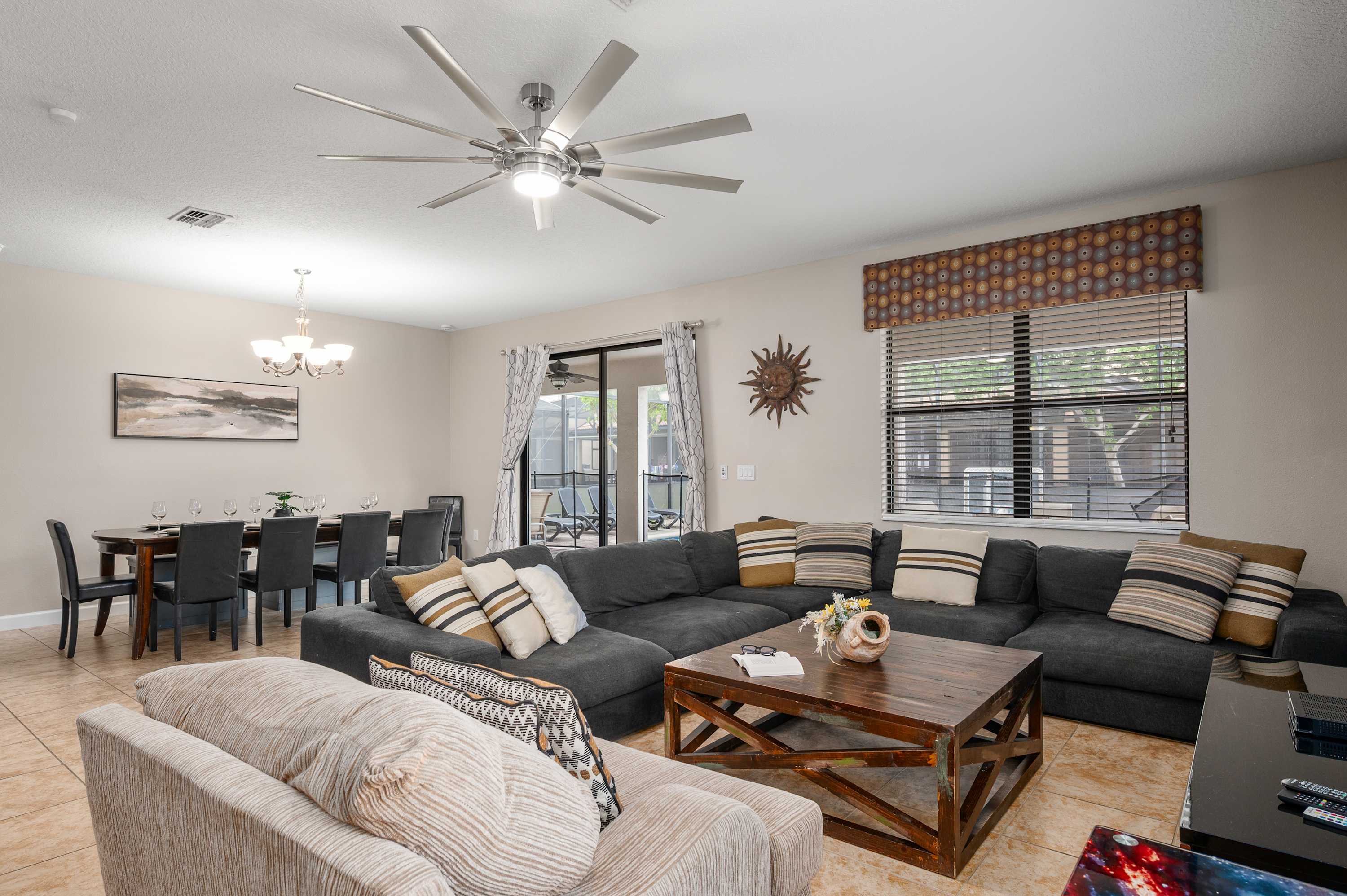 Bright open-concept living area w/ cozy seating & natural light throughout