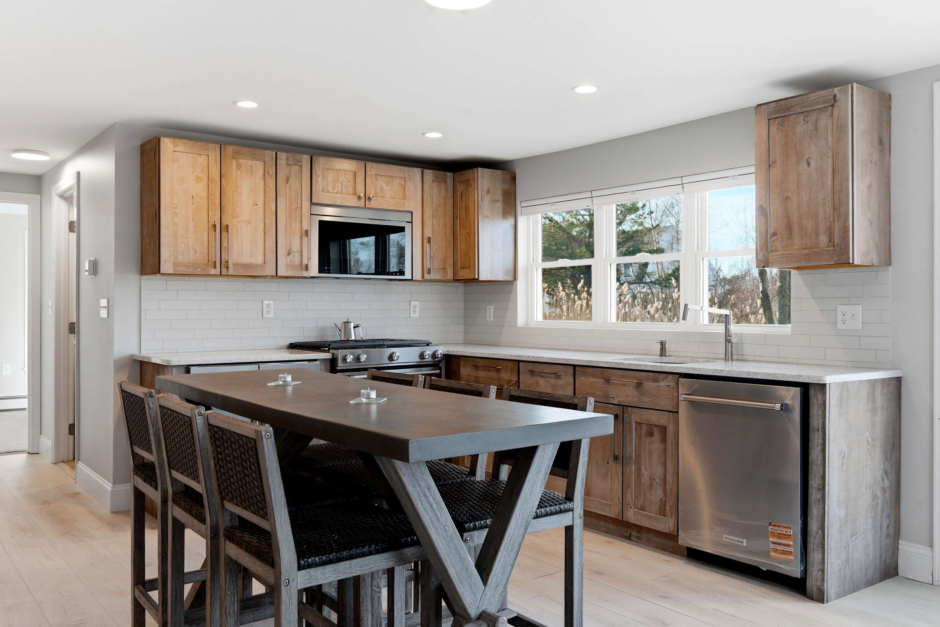 The open kitchen offers ample space & all the comforts of home​