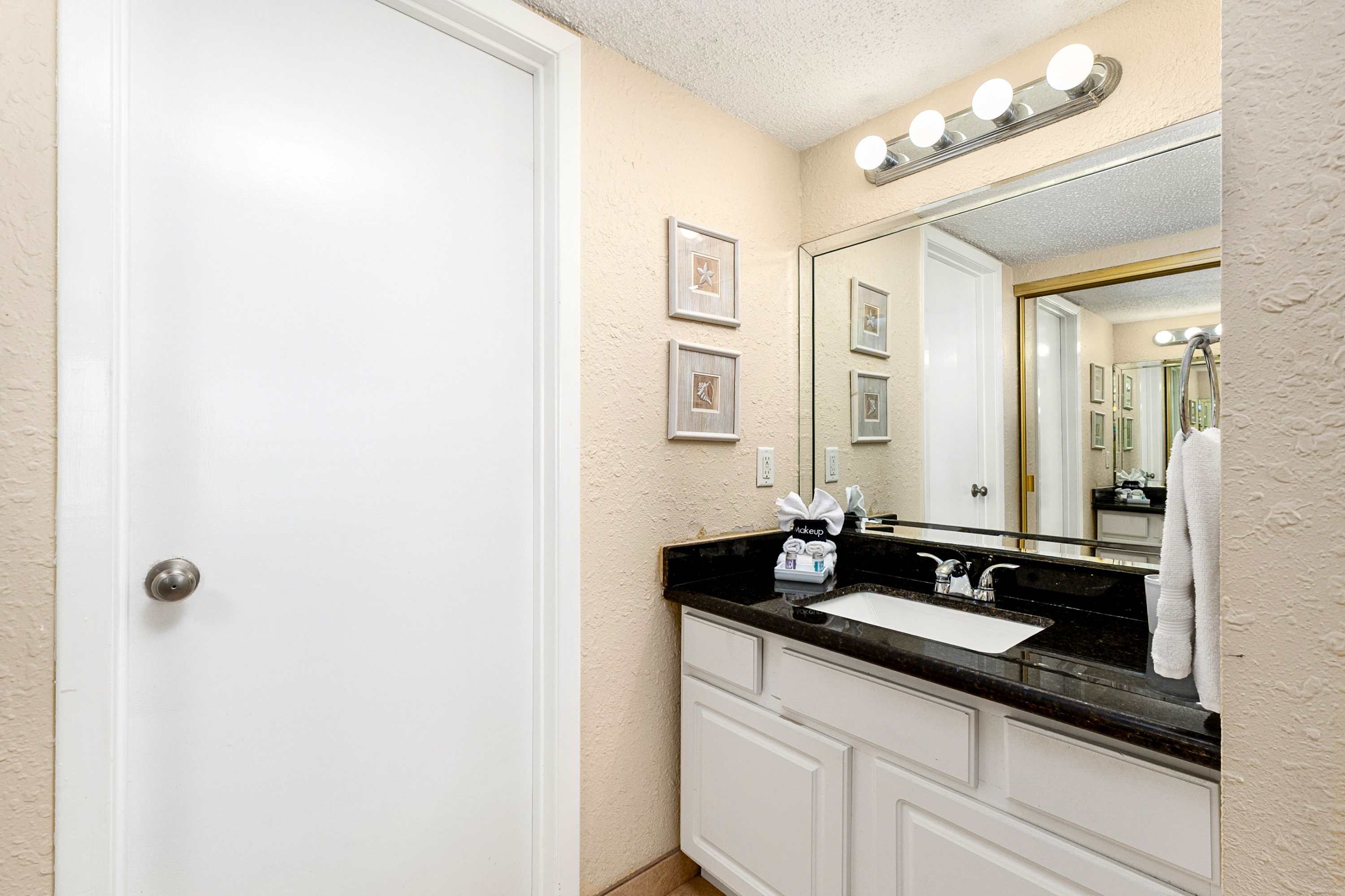 Well-lit bathroom with mirror for a fresh start to your day