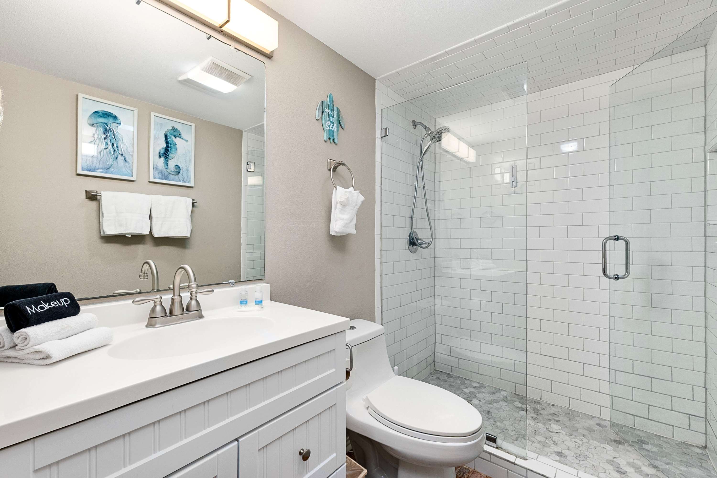 Start your day in style with a bright, modern bathroom and walk-in shower