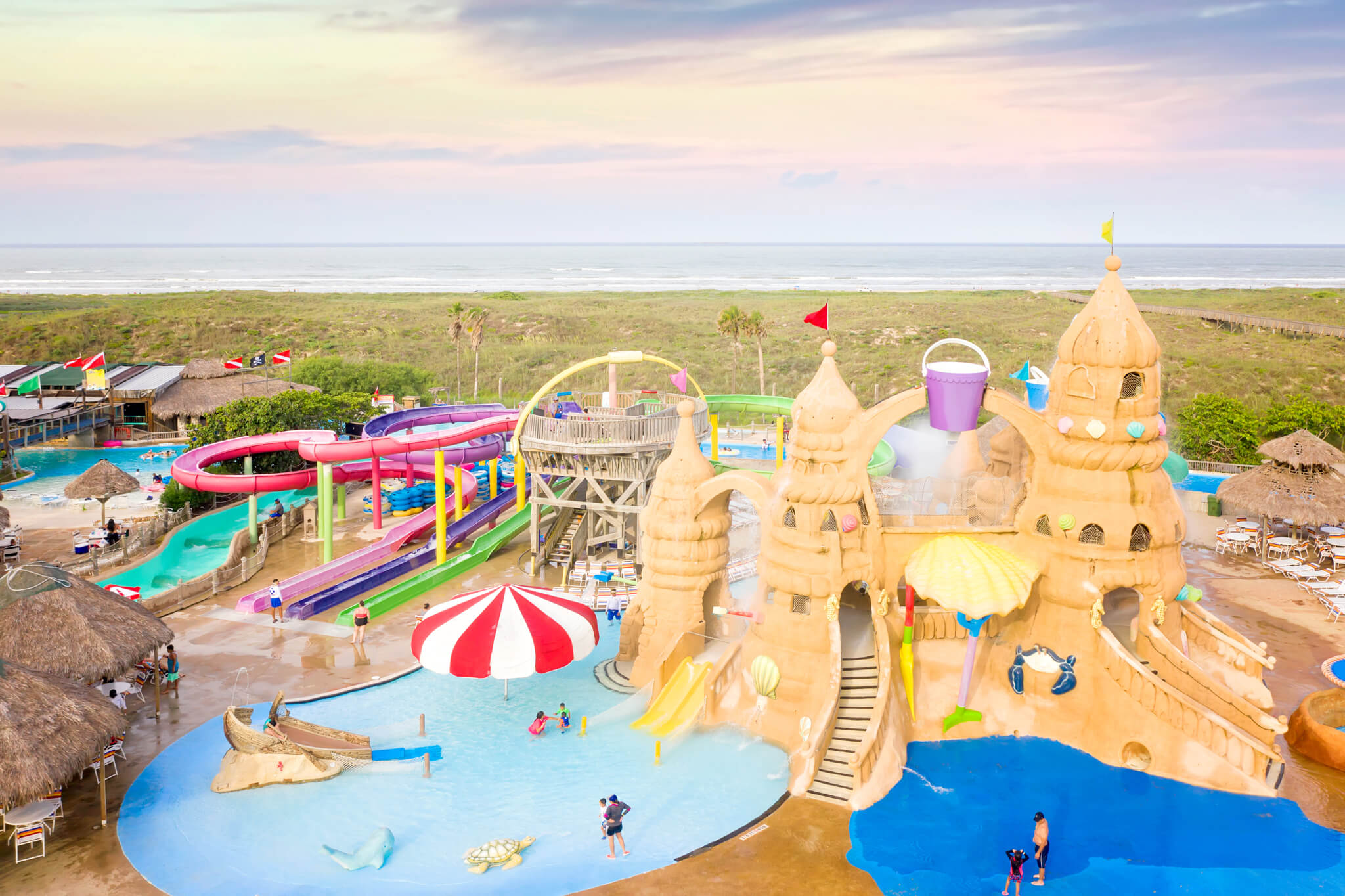 Offsite must‑visit Beach Waterpark in South Padre Island, featuring popular attractions like Sandcastle Cove and Wizard’s Waterways, perfect for family fun