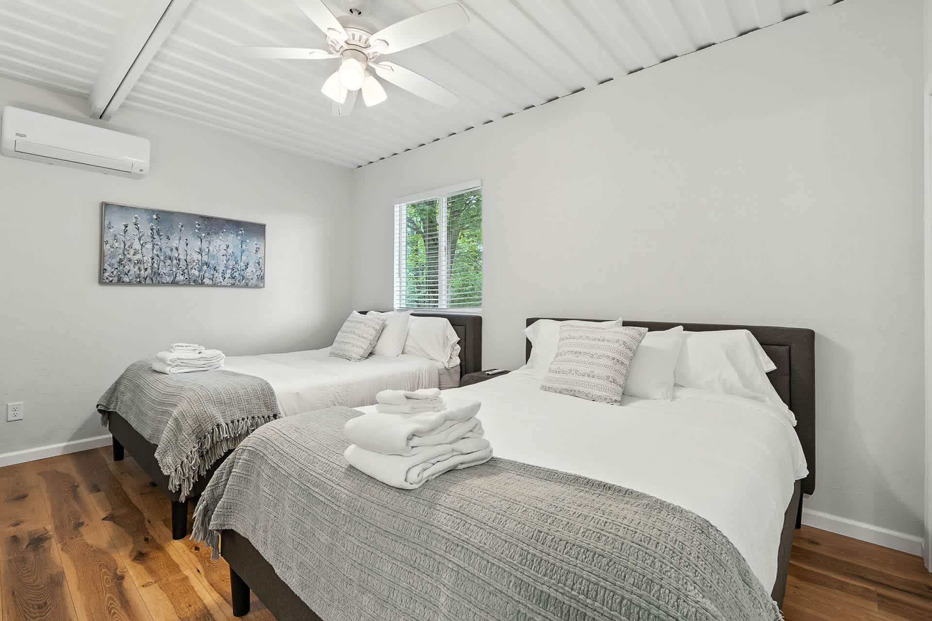 Bedroom 2: Two queen beds, ceiling fan