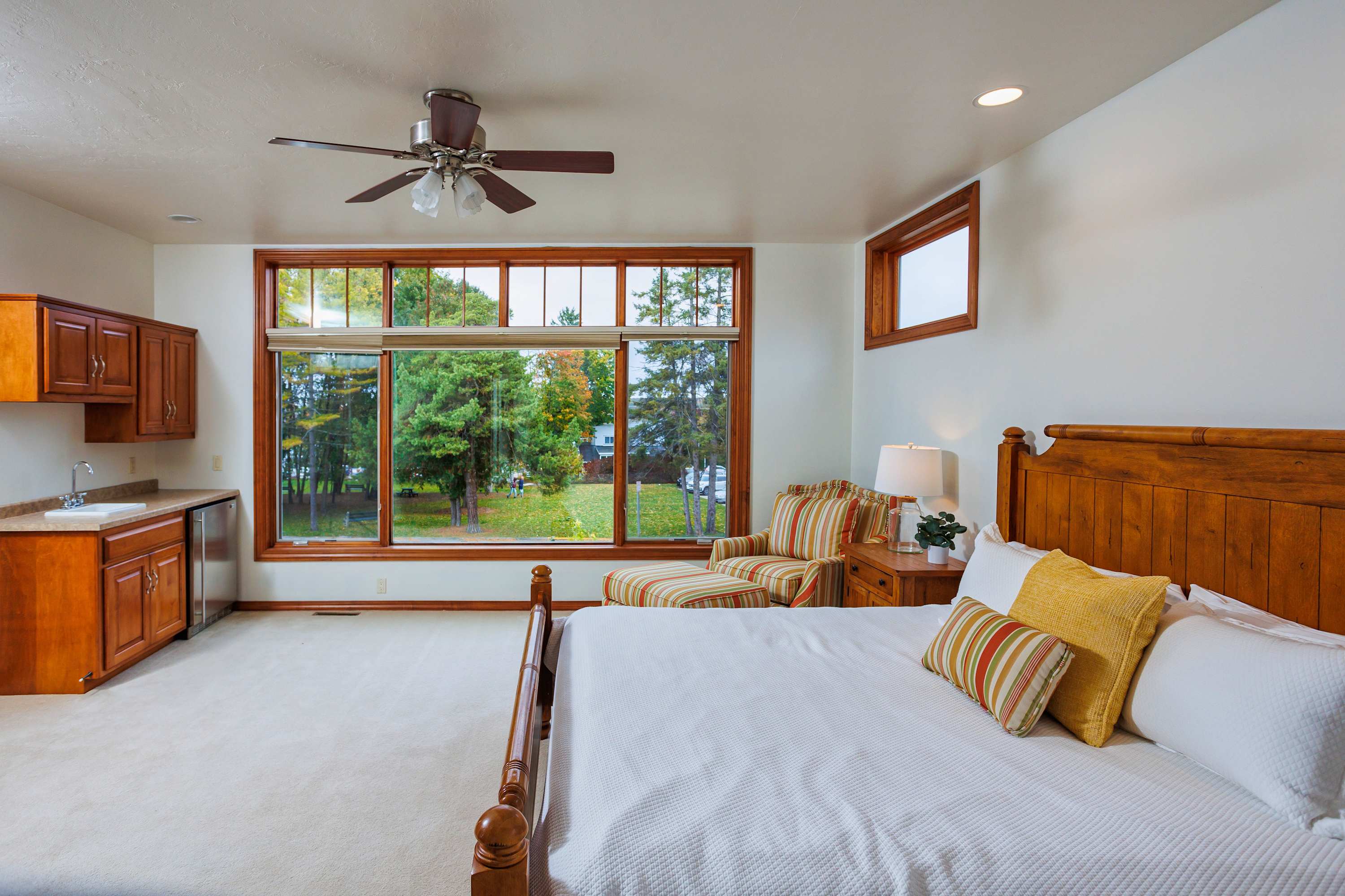 Primary bedroom not only offers space but a beautiful view- Trim has been painted as of 2026!