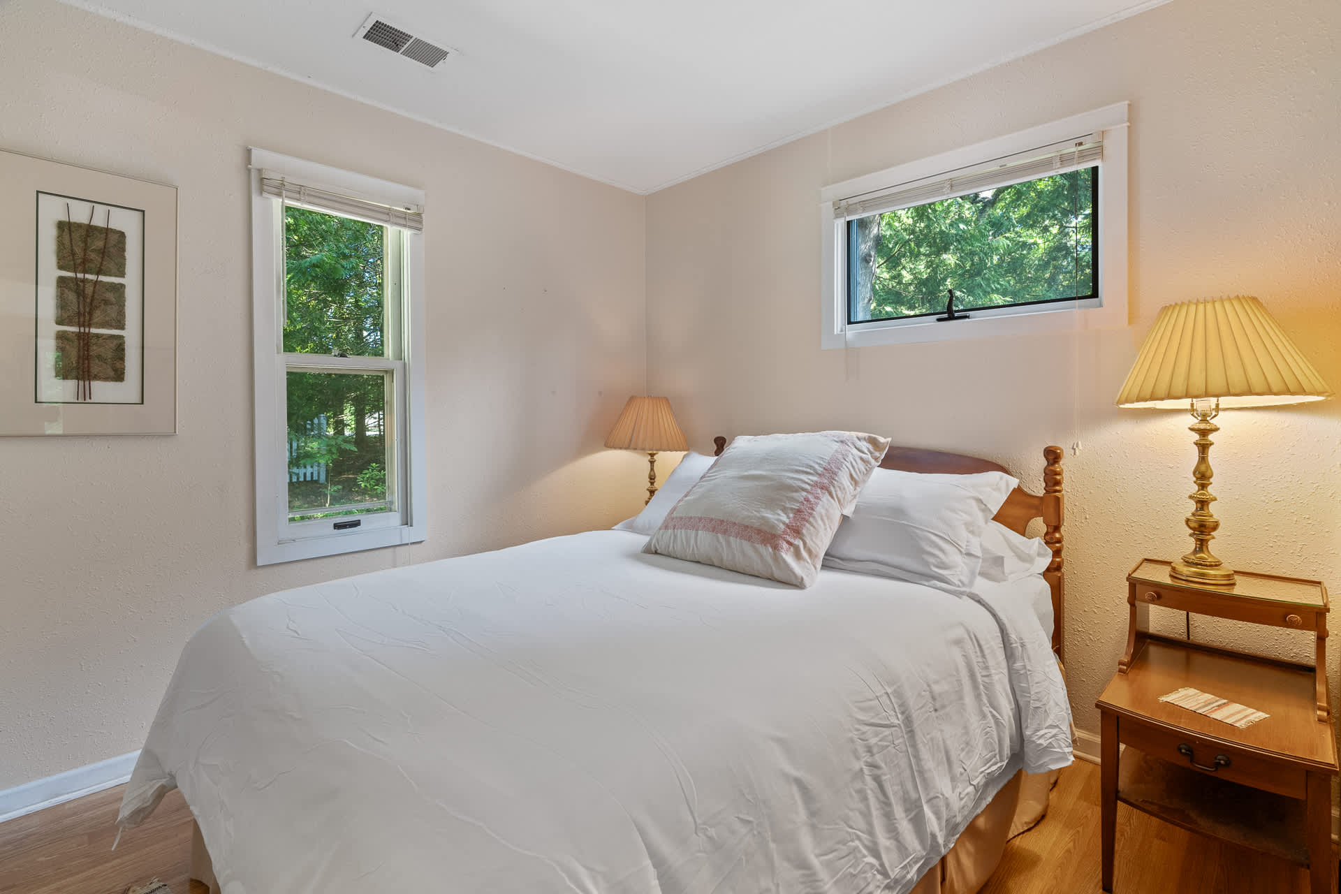 Bedroom 1 on main level includes a queen size bed