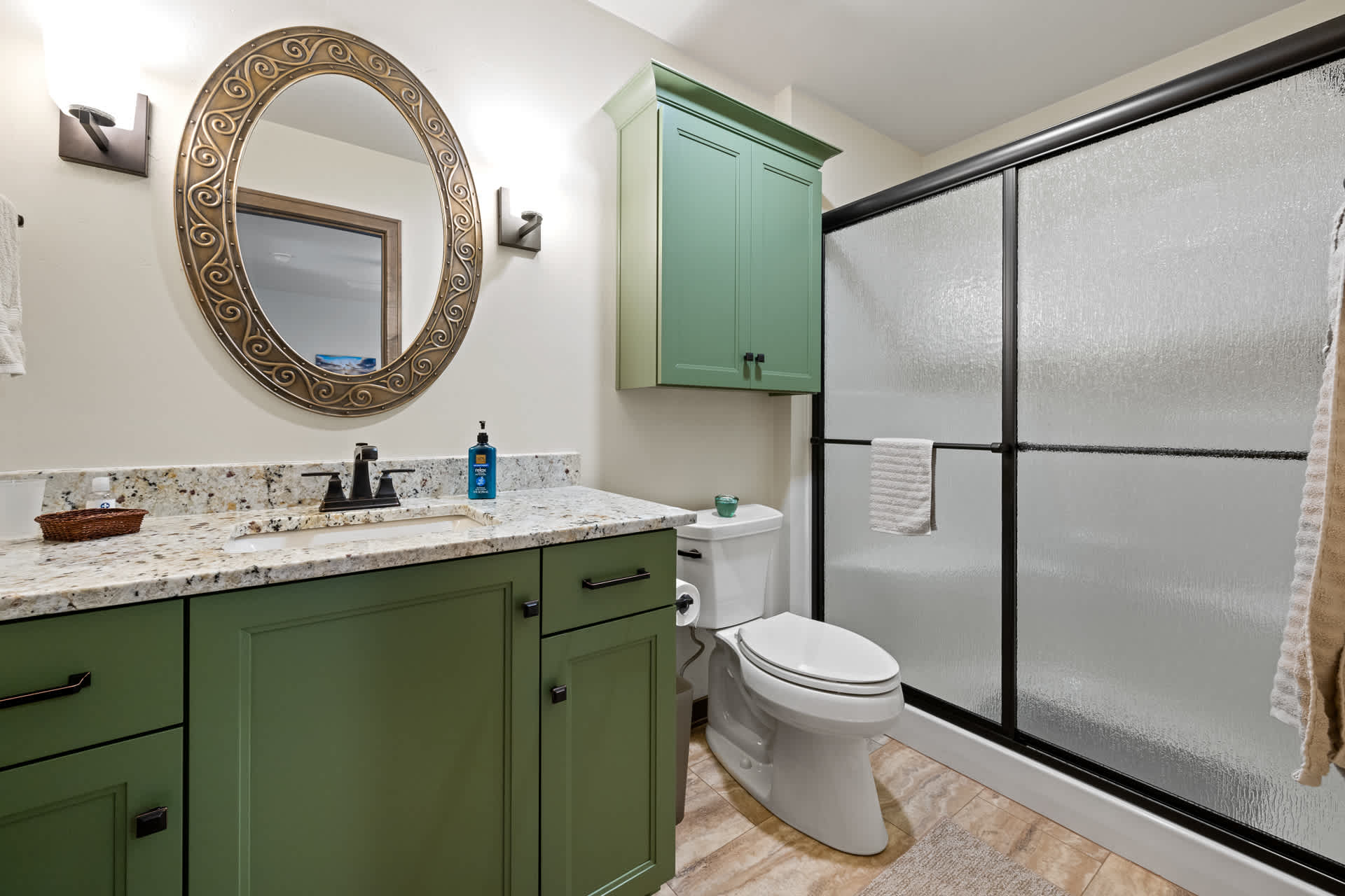 Bathroom 2 is attached to Bedroom 2 and includes a walk-in shower