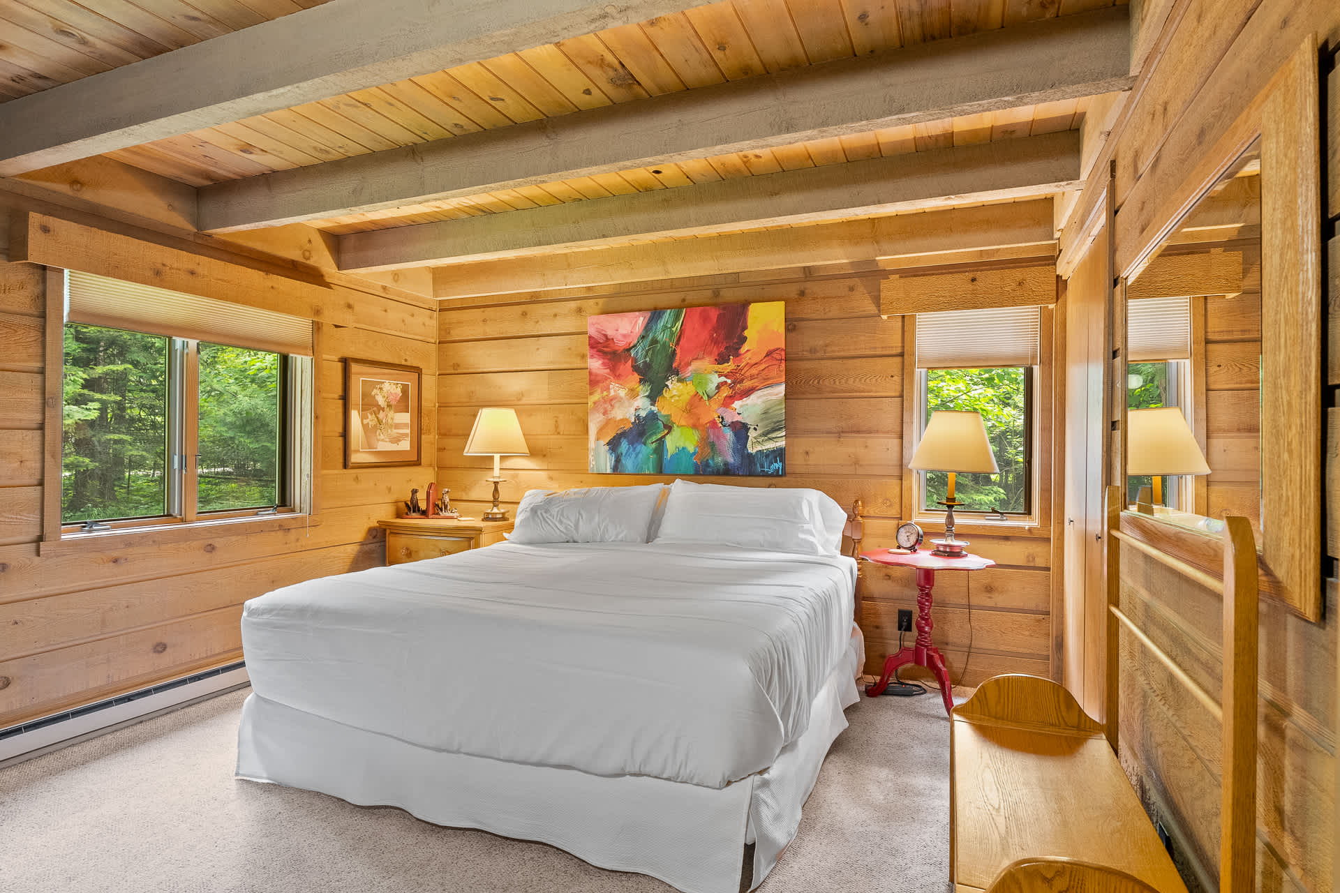 Primary bedroom offers a king bed