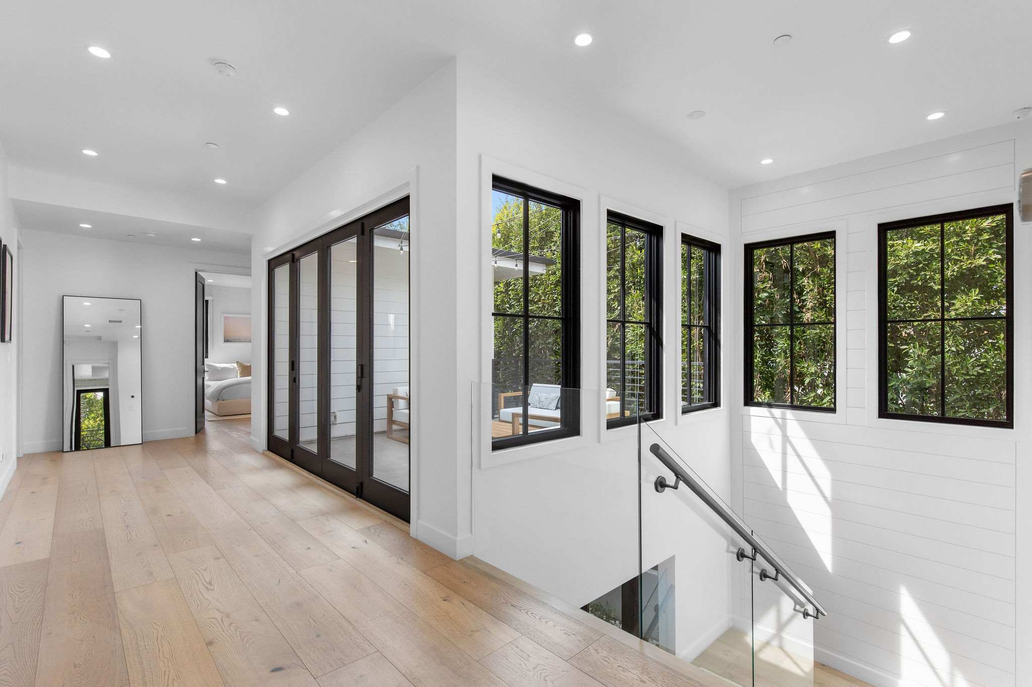 An upper level that feels open and quiet, offering separation from the main living areas in West Hollywood