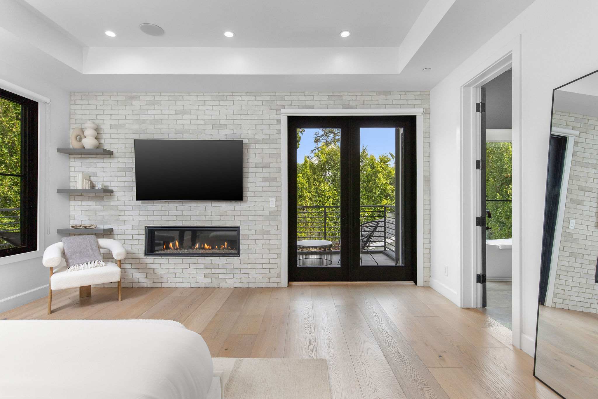 A bedroom that continues the home’s elevated design language, offering a quiet and private retreat within West Hollywood