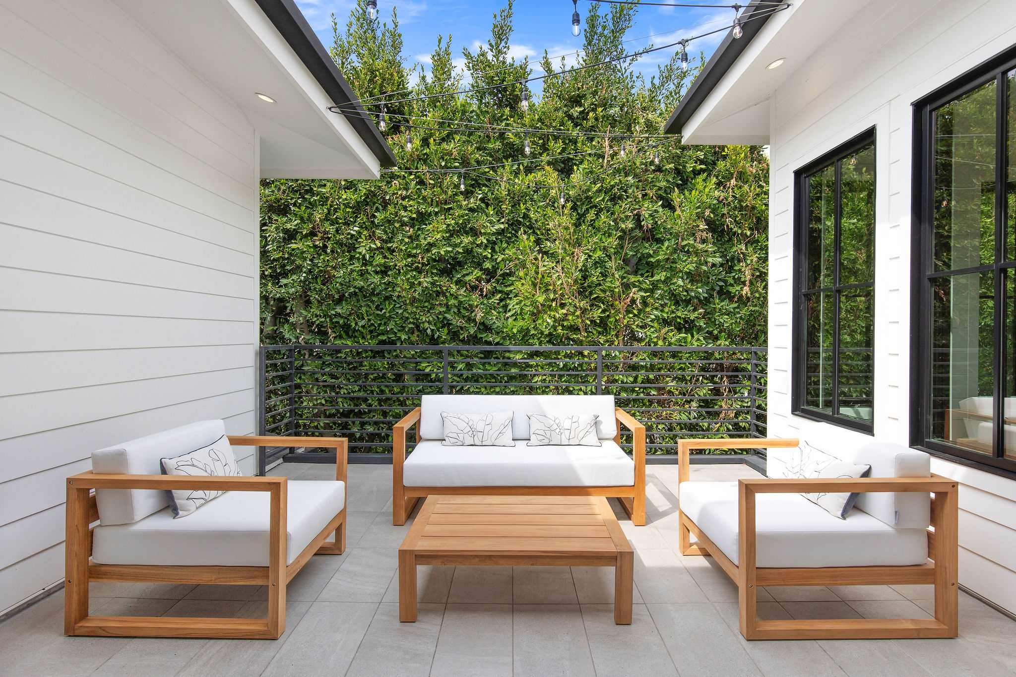 A secluded courtyard setting offering privacy and year-round outdoor living in West Hollywood