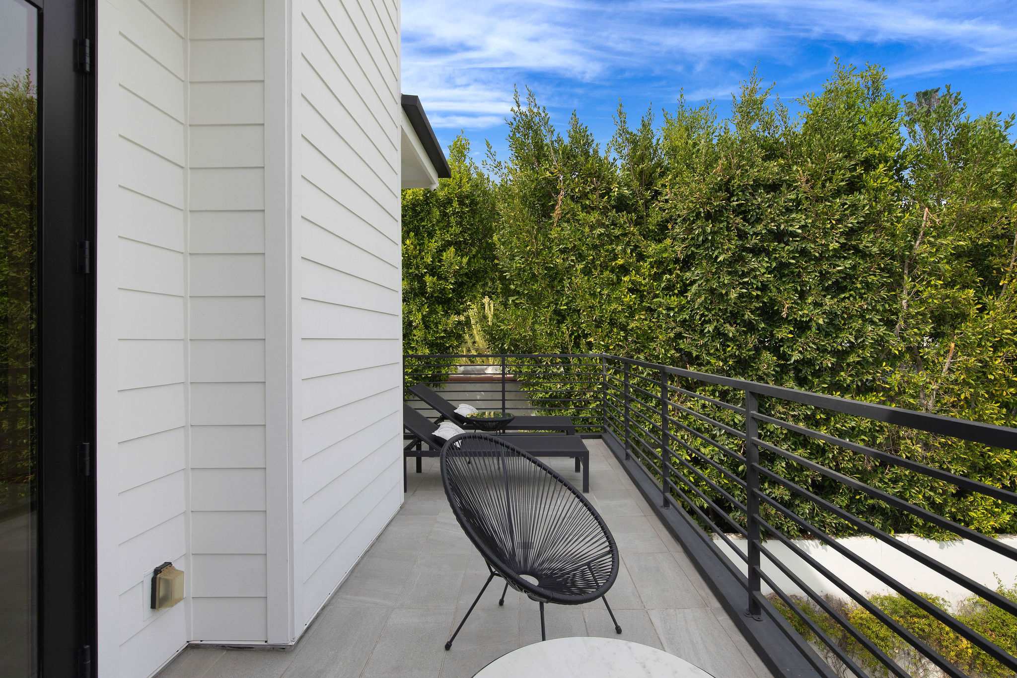 A primary suite extension with direct terrace access, creating a more exclusive indoor-outdoor living experience