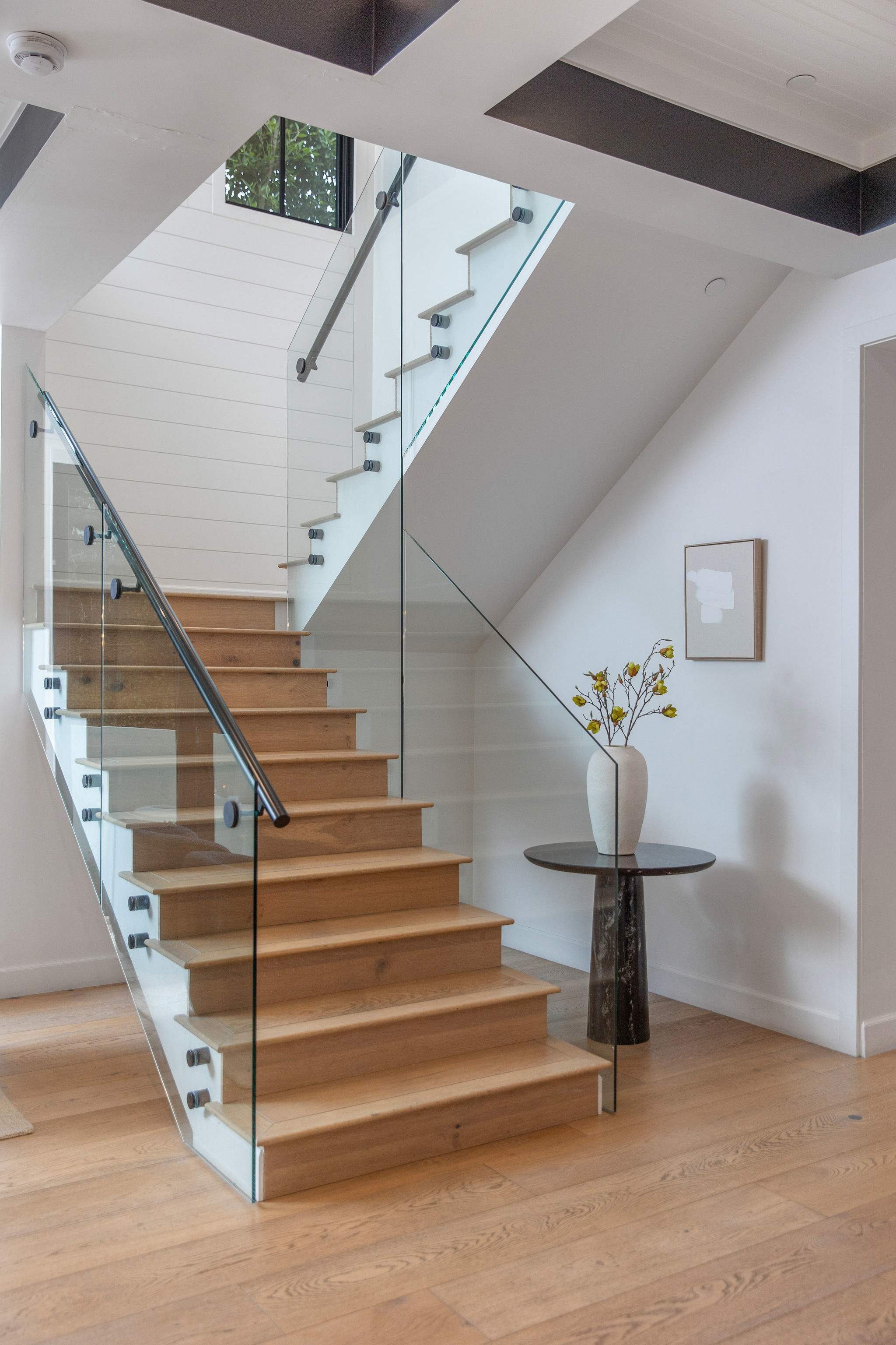A layout designed for flow, connecting both levels with ease while maintaining privacy throughout the home