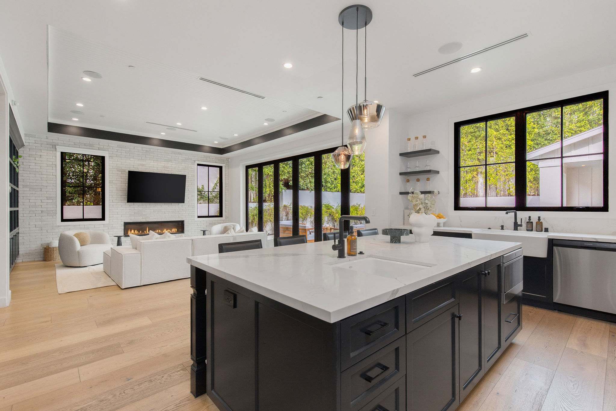 A professional-grade kitchen with dual prep areas, custom cabinetry, and luxury finishes