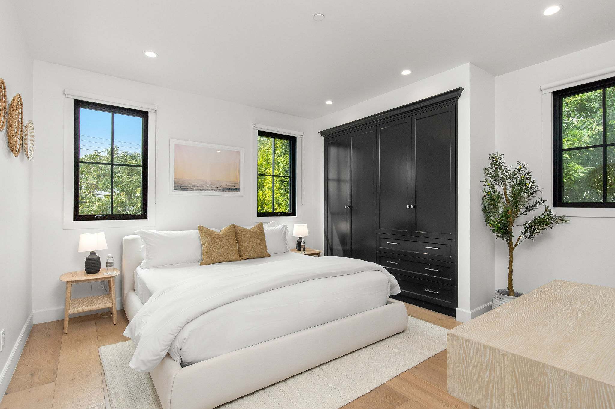 Bedrooms finished with soft neutrals and tailored details