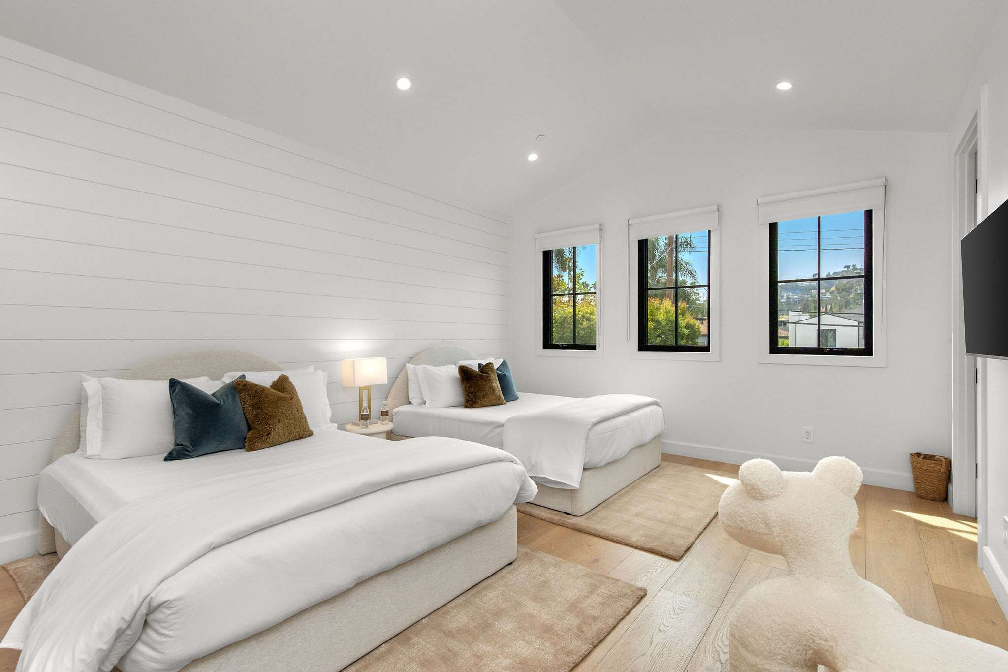 Generous room sizes with large windows and natural light