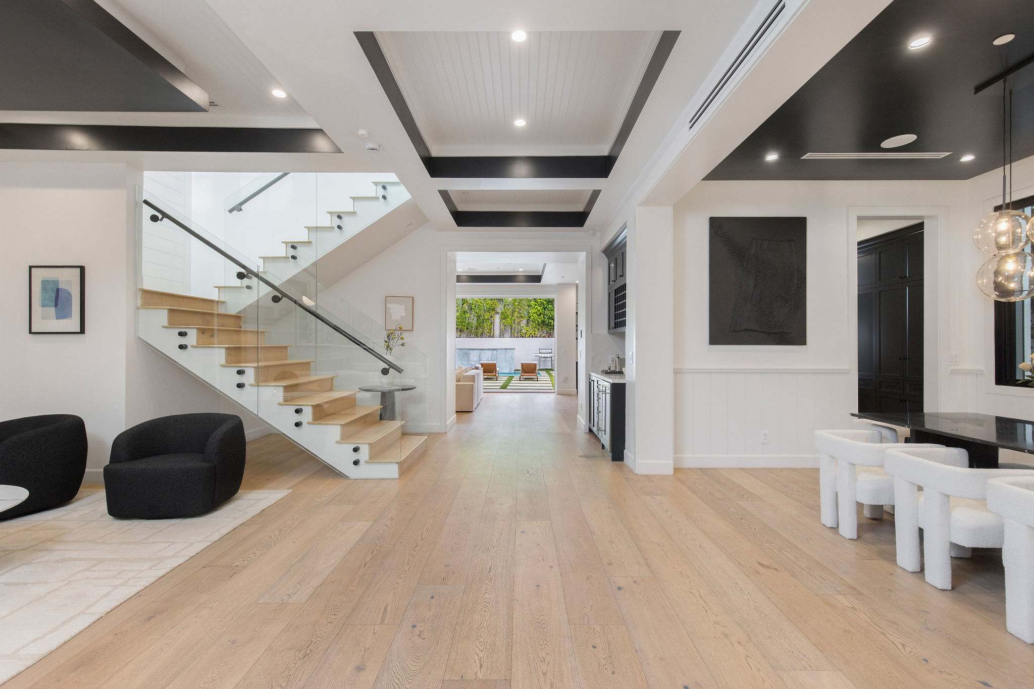 Move through a layout that keeps everyone connected, yet gives each space its own moment