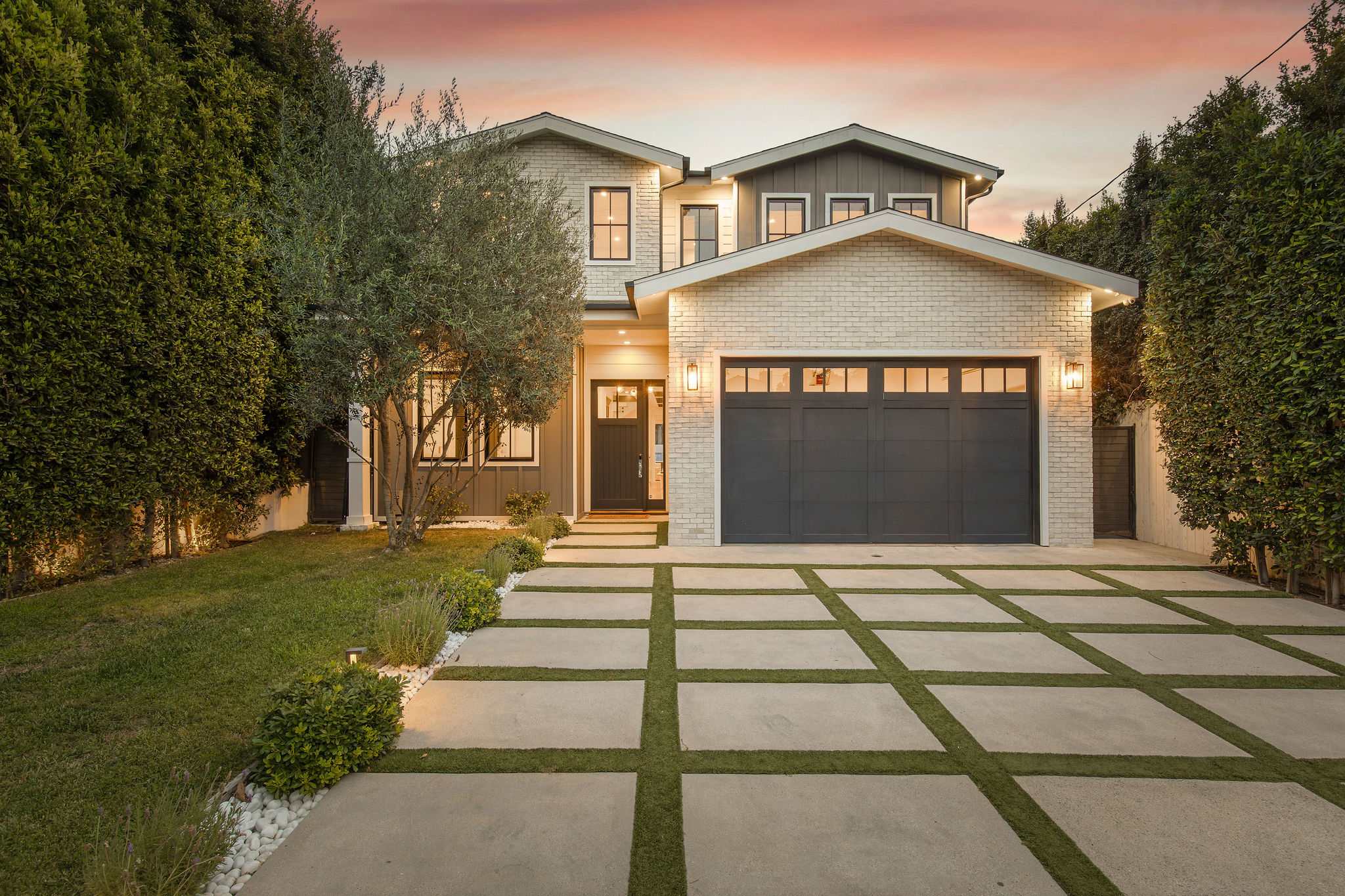 A gated West Hollywood residence with strong architectural presence and a private, residential setting