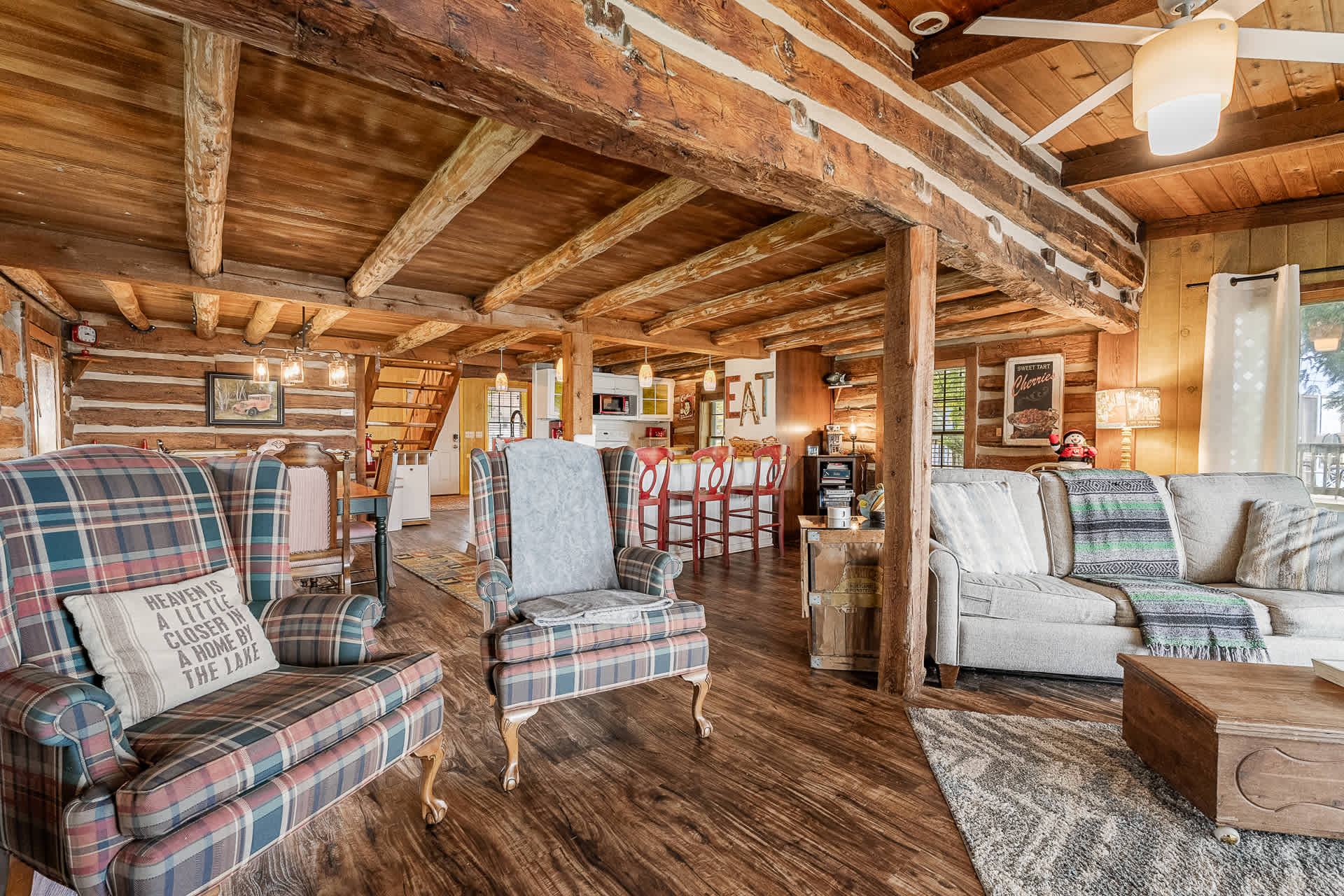 large rustic living room with original wood beams!