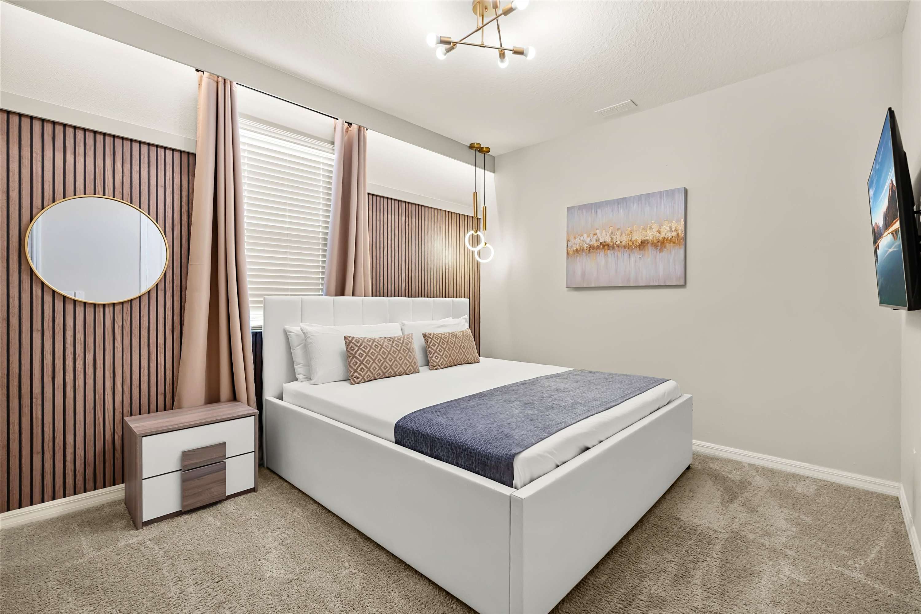 Cozy queen bedroom with elegant style, ideal for a peaceful night’s sleep