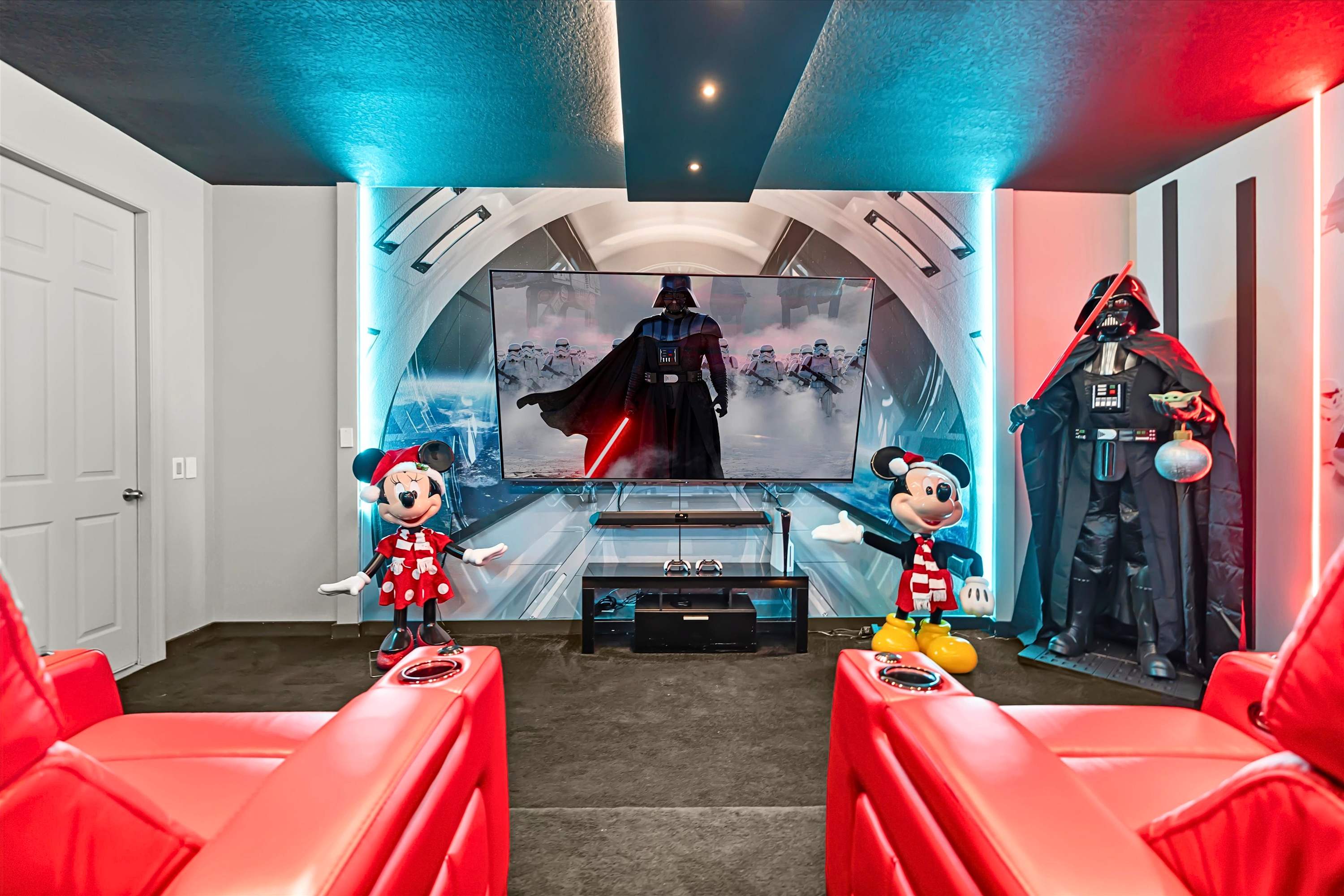 Home theater area with a large TV, perfect for watching movies or playing games with family and friends