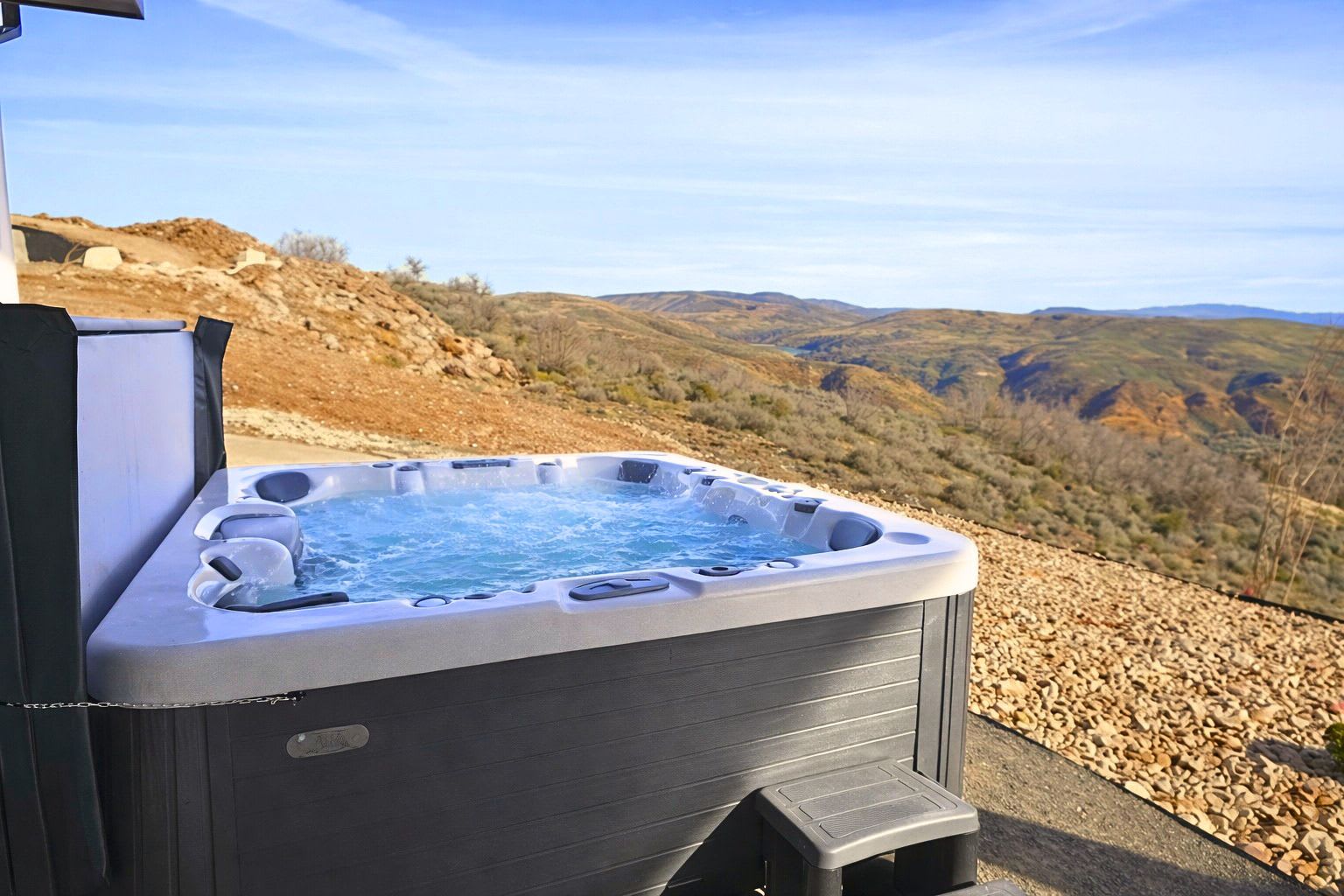Private Hot Tub on the patio – so perfect for relaxing while enjoying the view