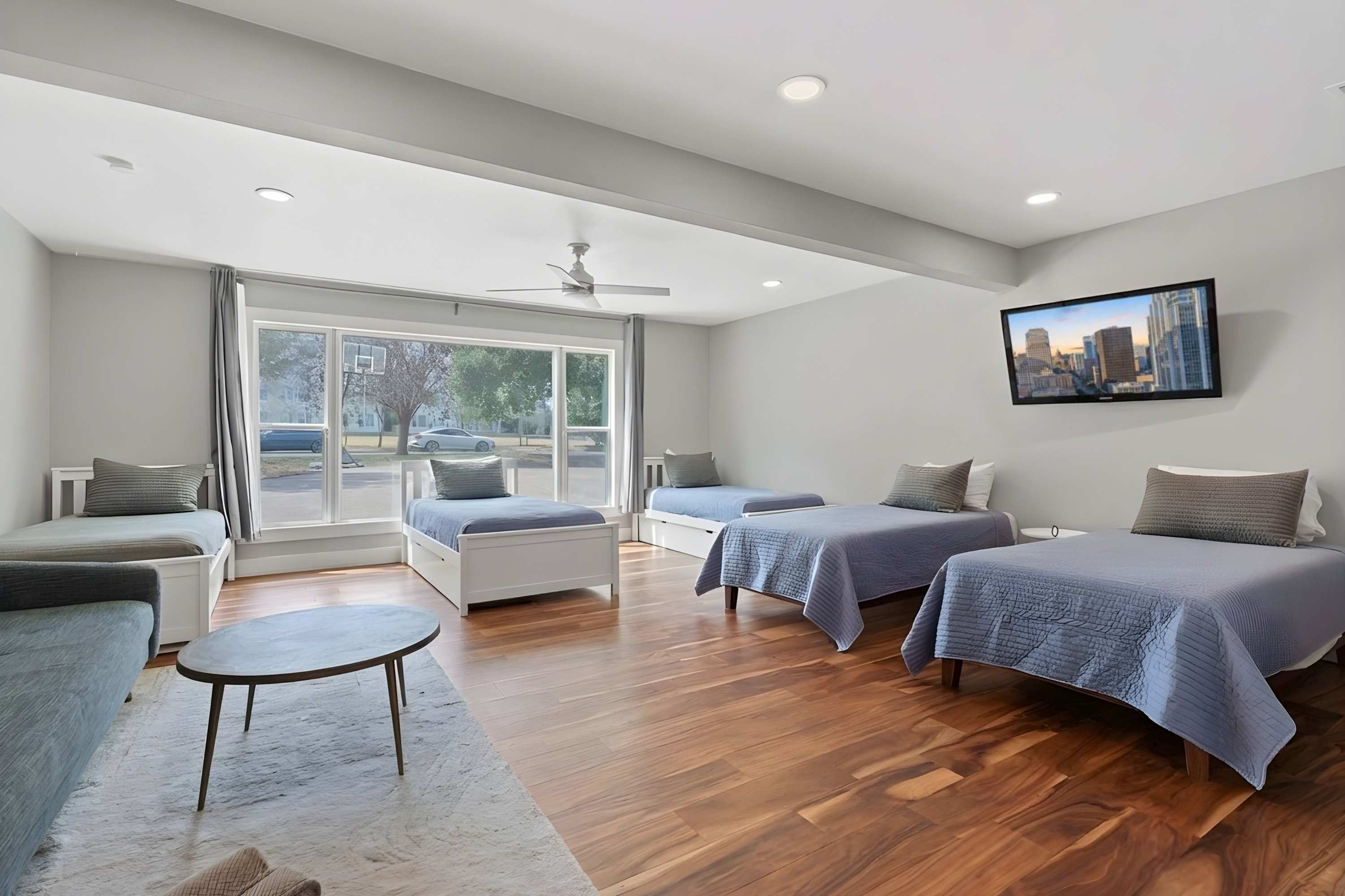 5 Twin beds (3 with pull-out trundles — total of 8 Twin beds) | Sleeps 8 | Ensuite bathroom with toilet and shower (hairdryer provided)