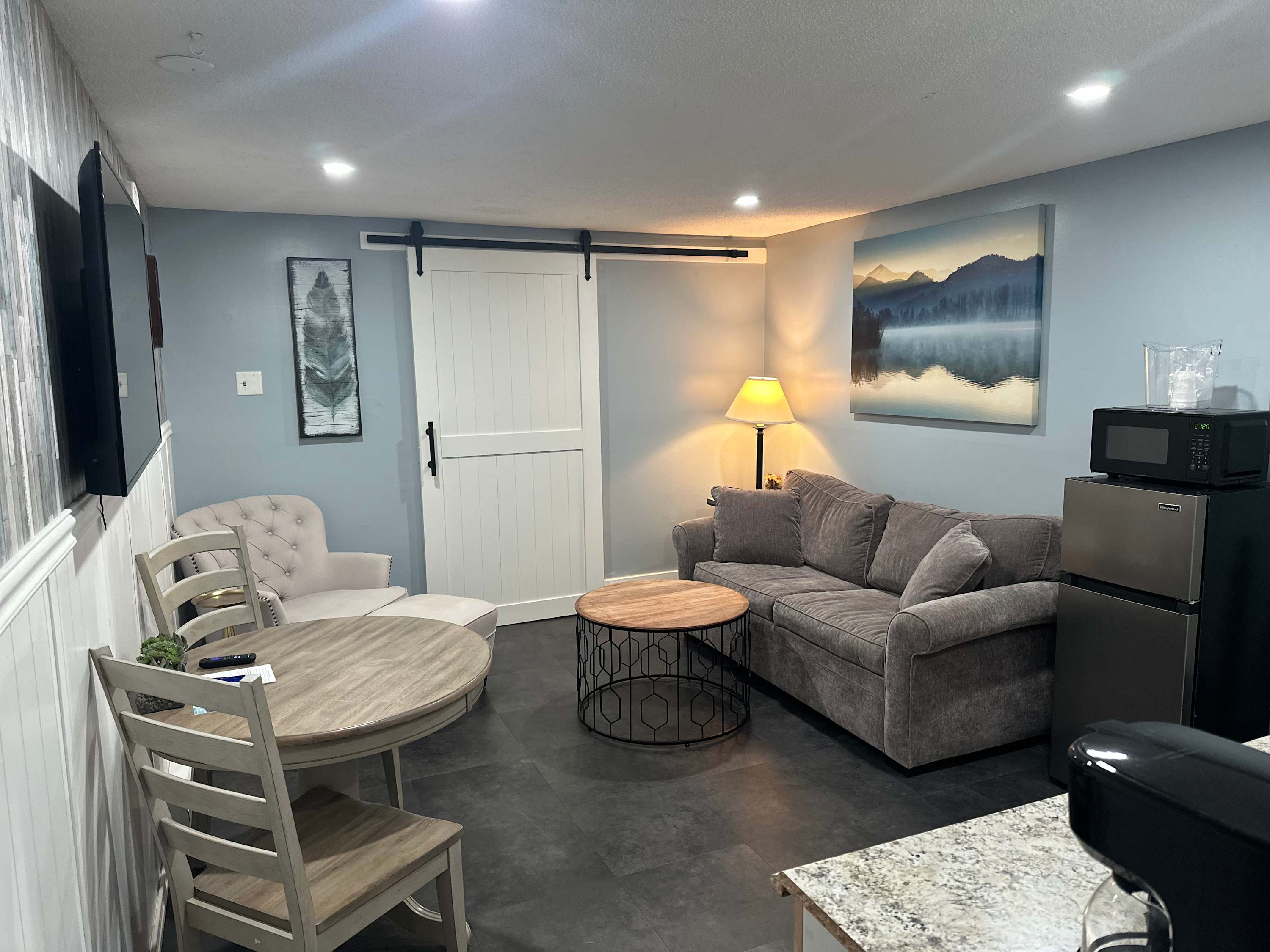 Curl up in stream your favorite entertainment in the inviting living room area​