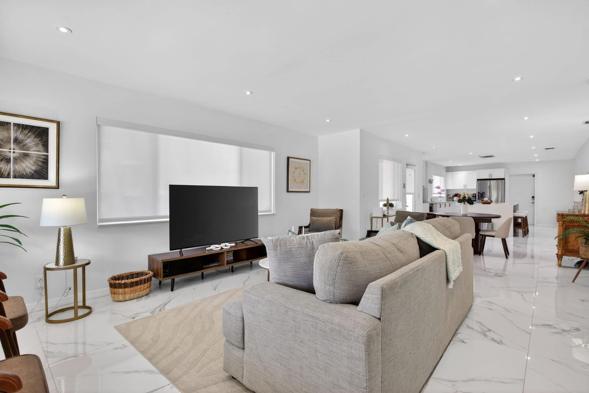 Curl up in the chic living room & stream your favorites on the smart TV​