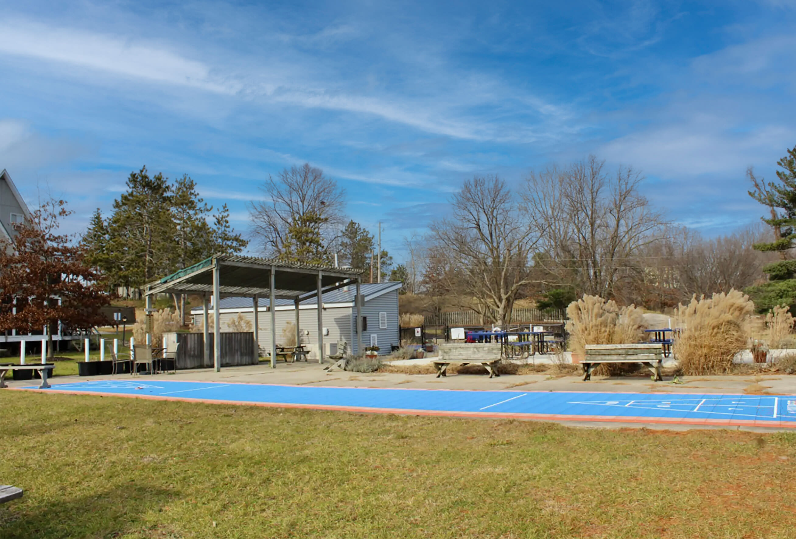 Lazy chalet days with shuffleboard, sunshine, and open-air lounging.