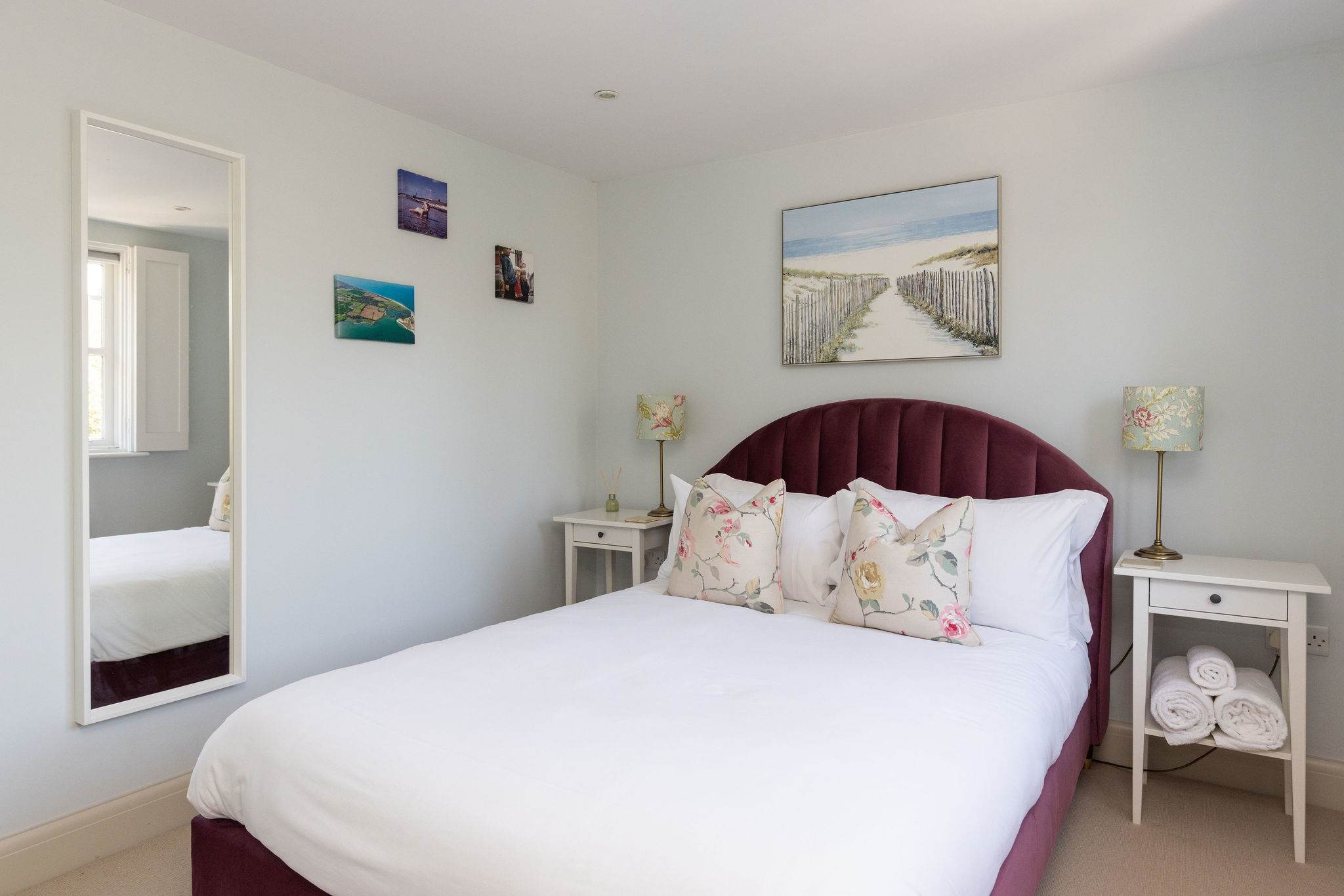 Elegant double bedroom with soft coastal tones
