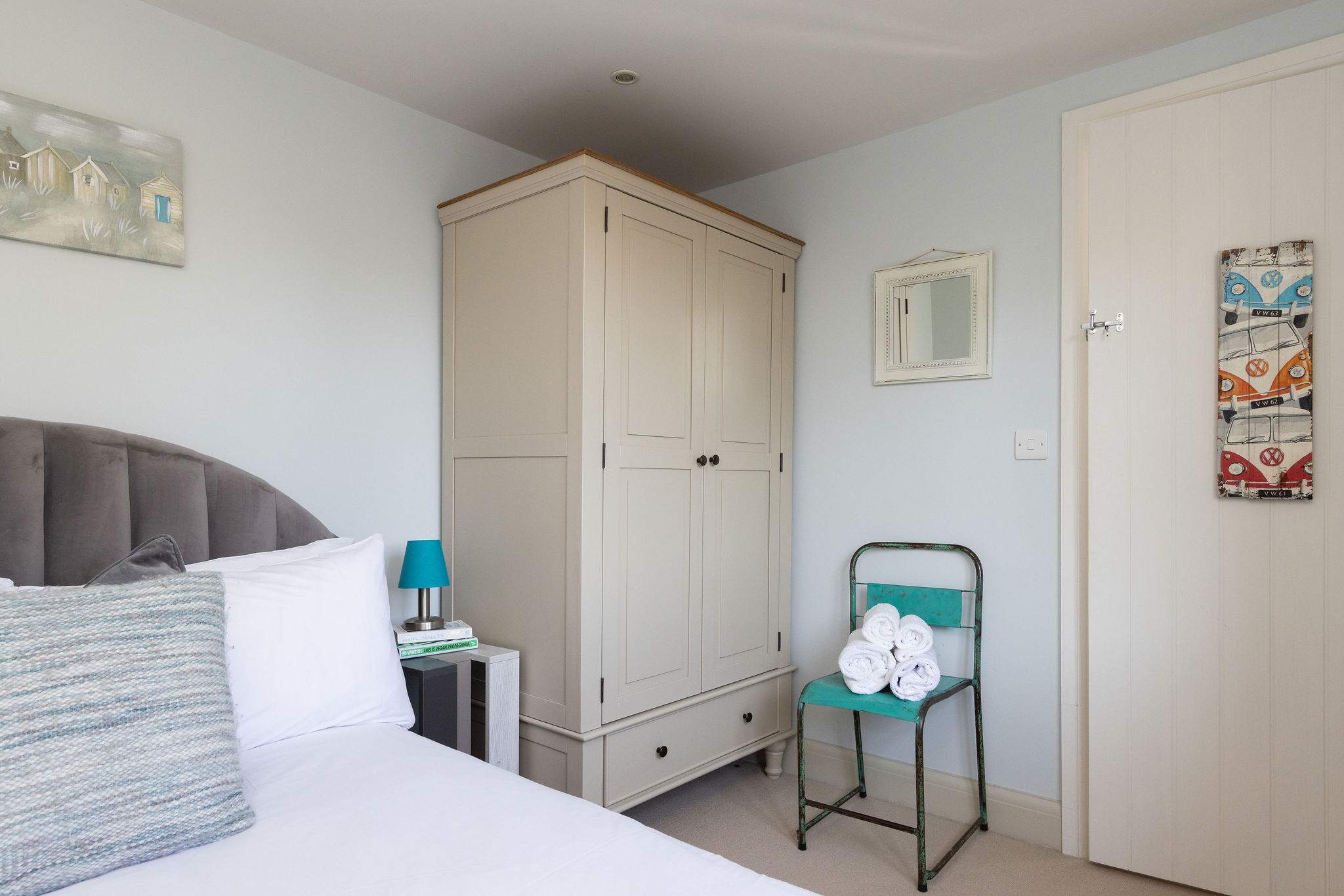 Calm, comfortable space with storage and natural light