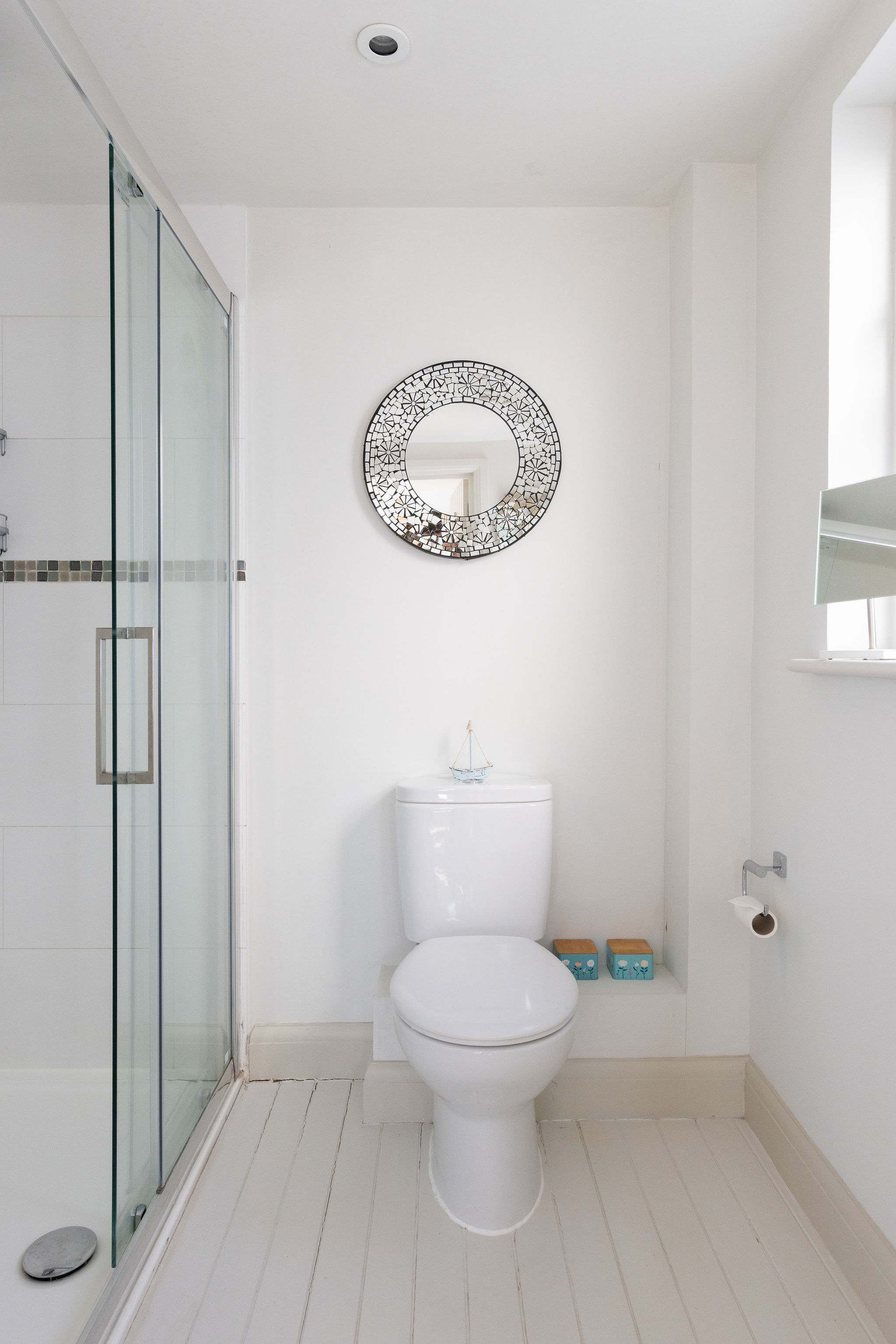 Bright shower room with clean, modern finish