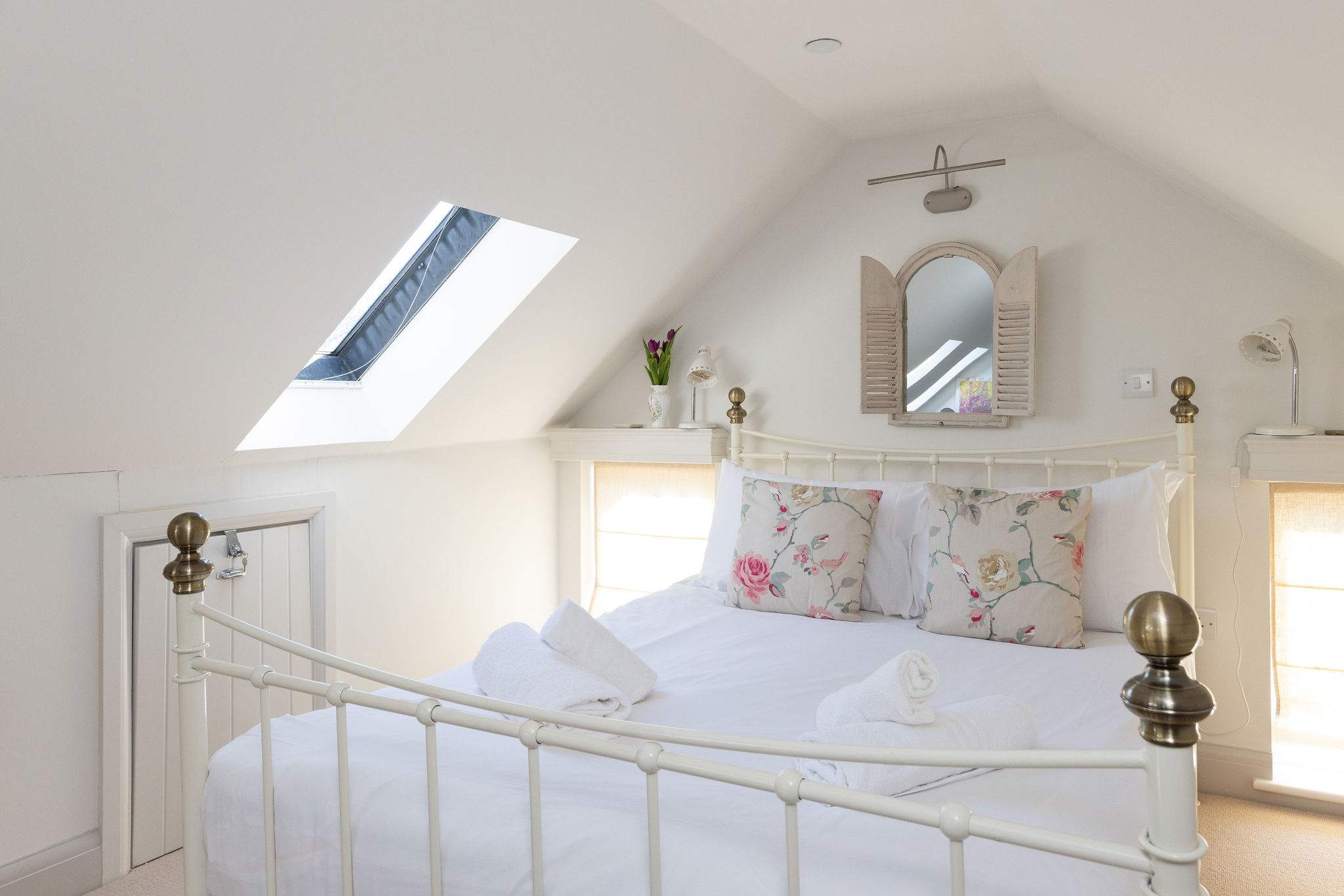 Peaceful top-floor bedroom with cosy, tucked-away feel
