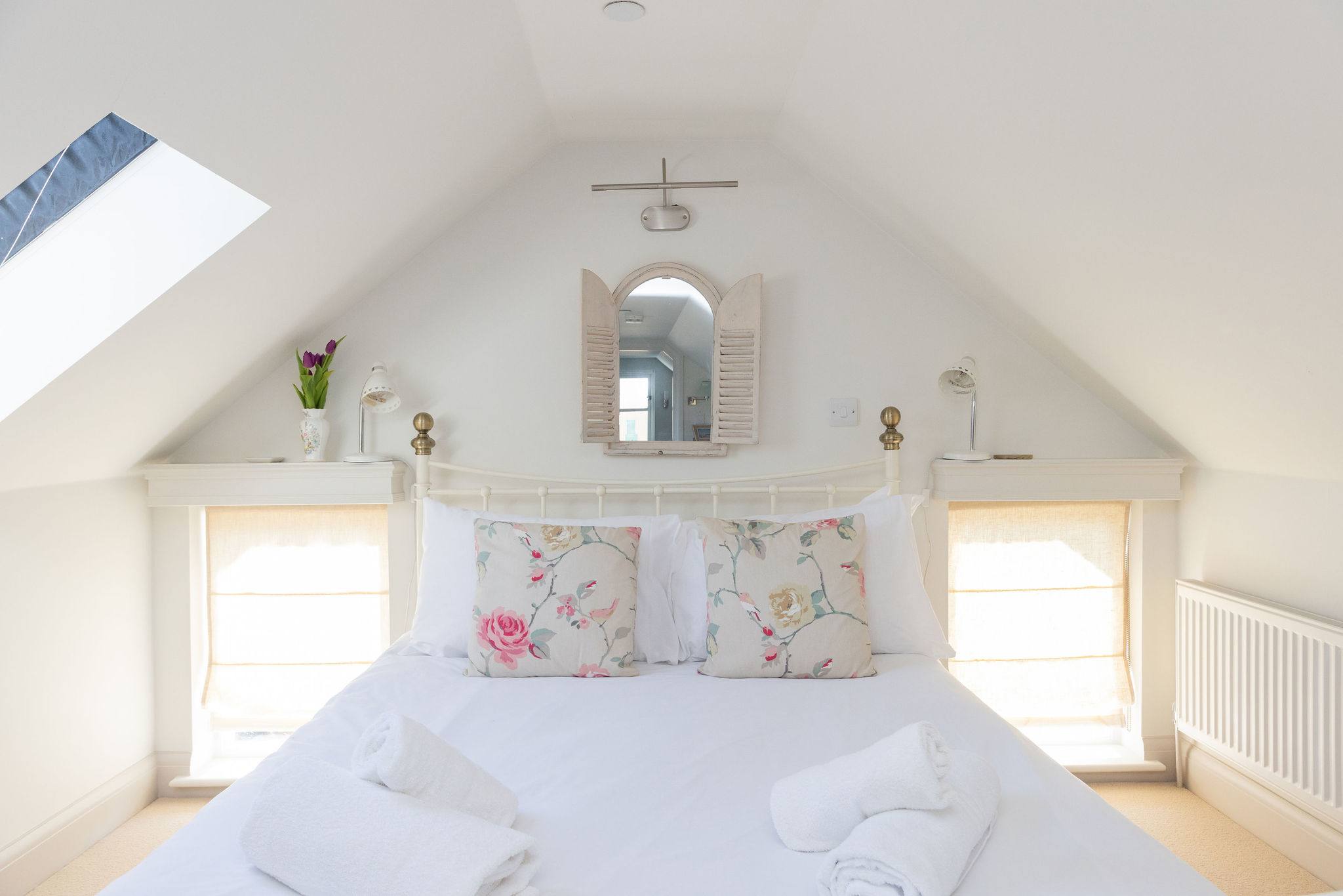 Beautifully styled loft space with calming coastal tones