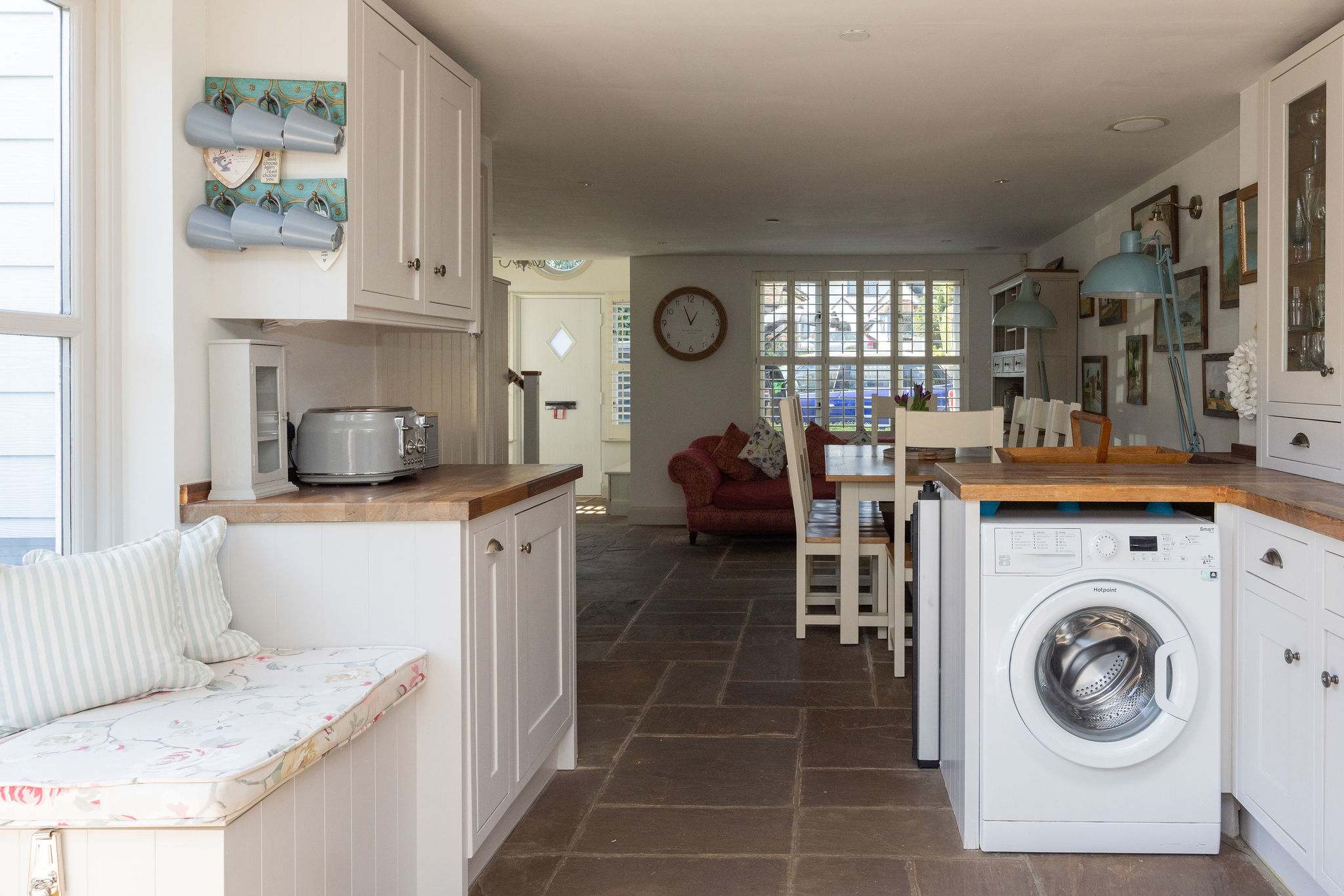 Open-plan kitchen flowing into a sociable dining and living space