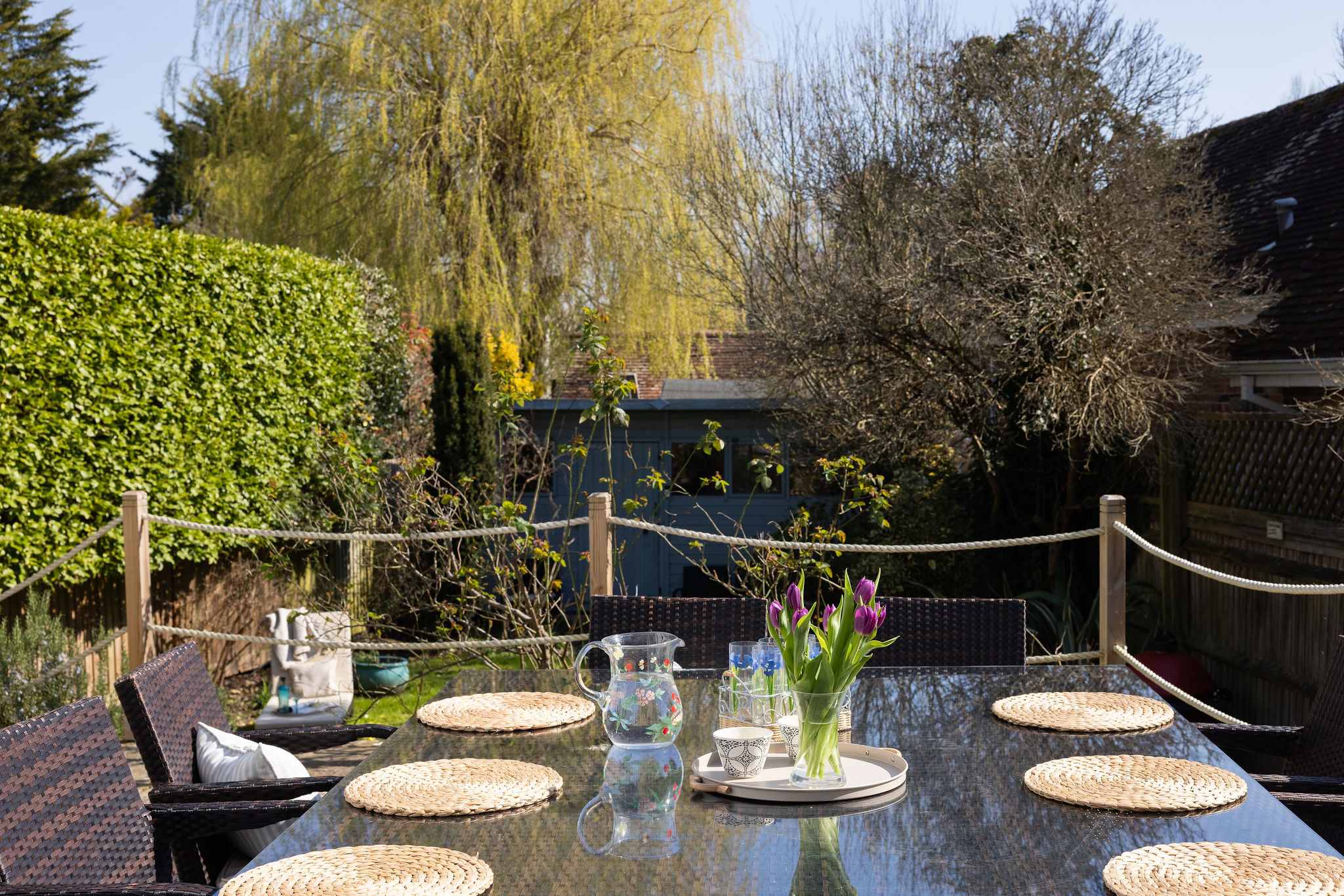 Sunny terrace perfect for al fresco dining with garden views