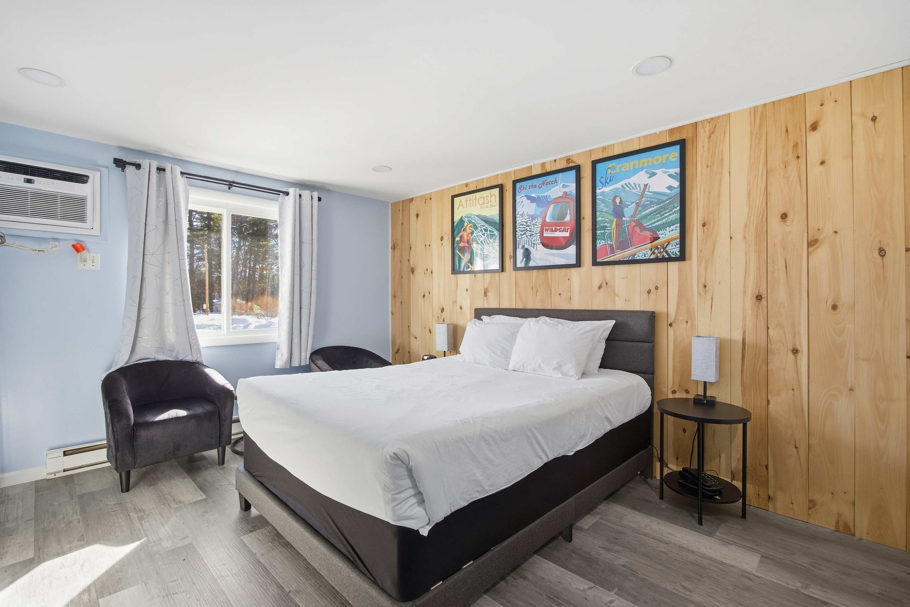 Recharge in this inviting suite, featuring a king bed, dining area, & TV​