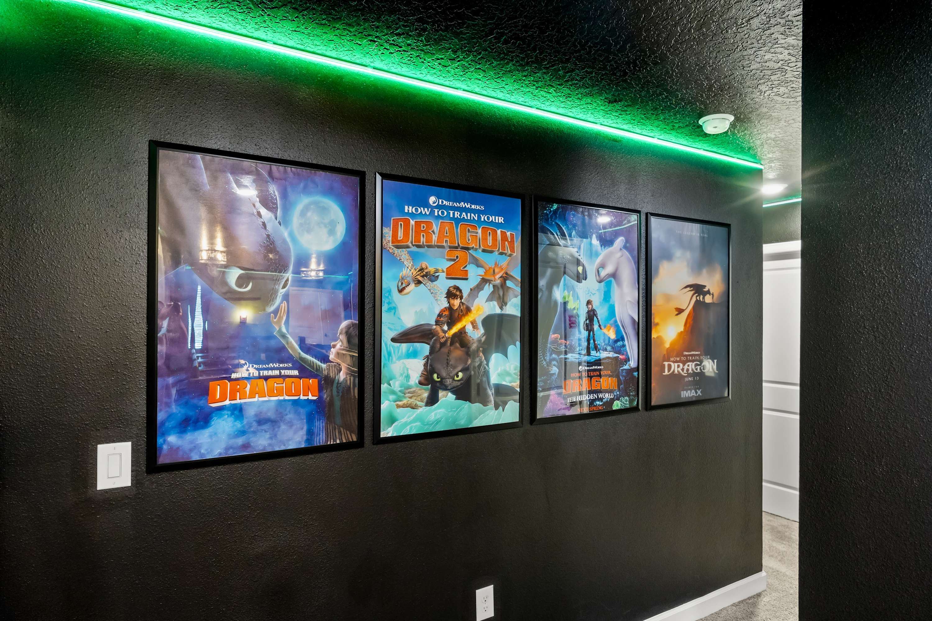 Themed movie wall with LED accents, adding a cinematic touch to the space.