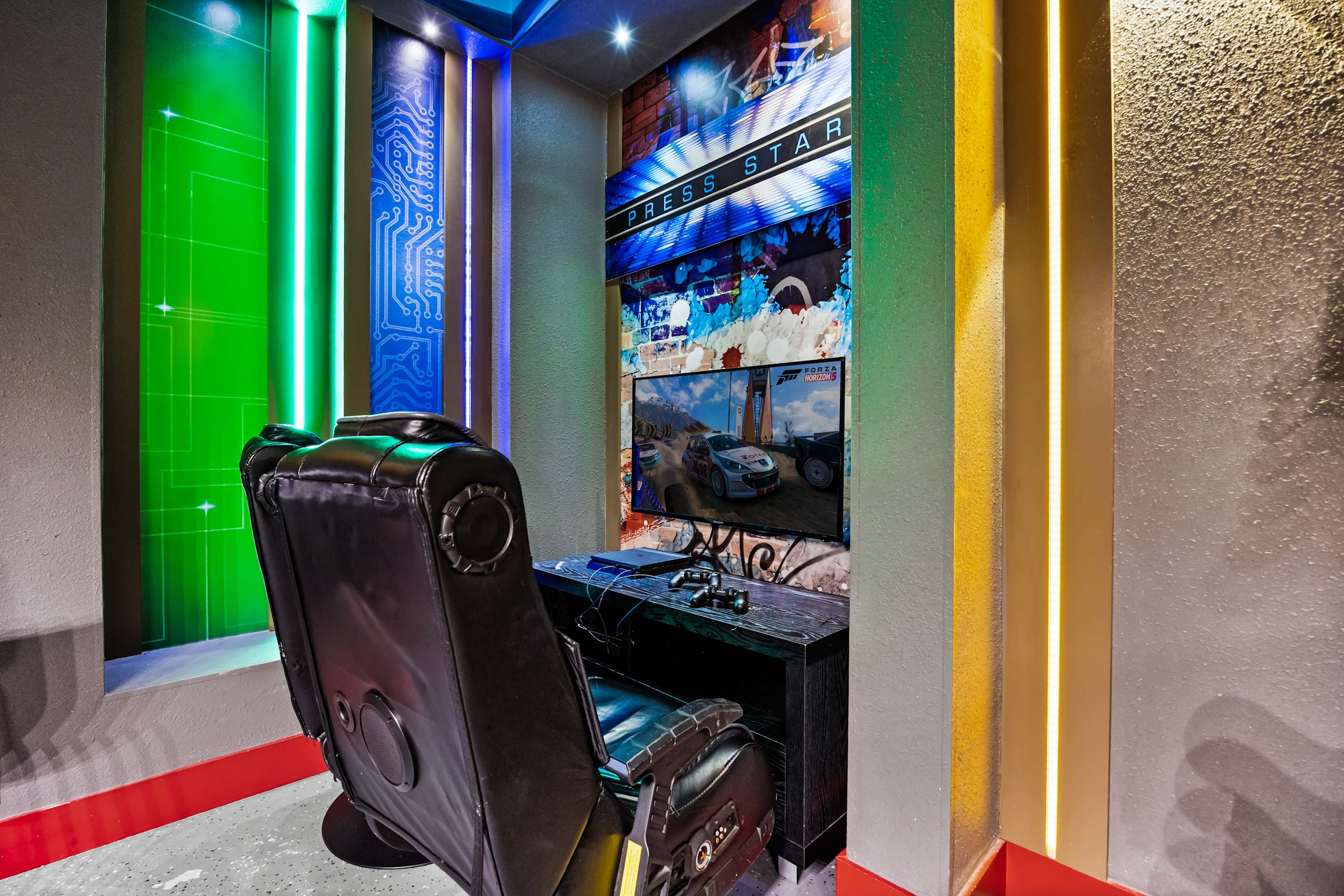 mmersive gaming station with simulator setup and LED lighting for a next-level experience.
