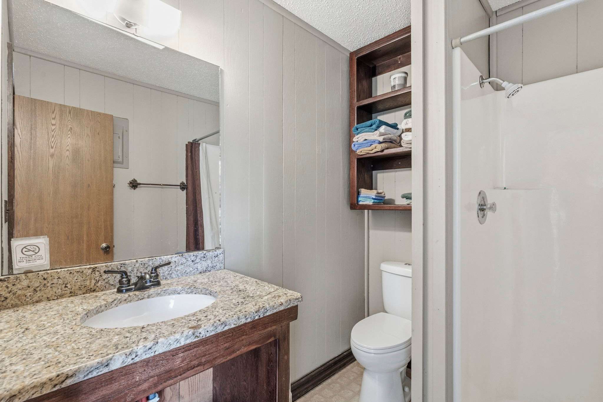 3/4 bathroom with shower stall
