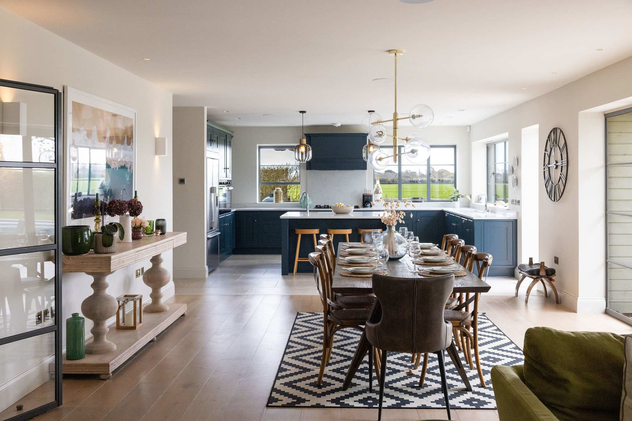 Gather in the spacious open-plan kitchen and dining area, designed for sociable entertaining.