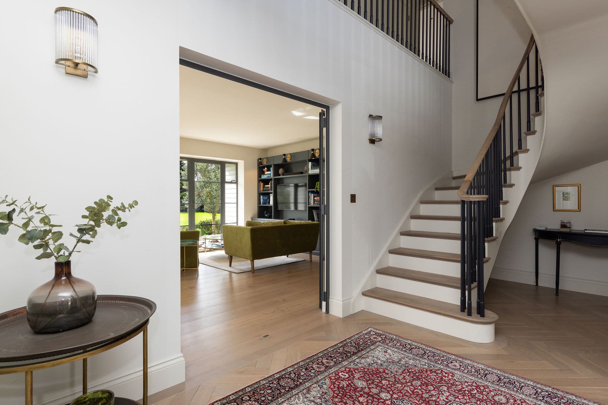 A bright, welcoming entrance sets the tone for this beautifully designed coastal retreat.