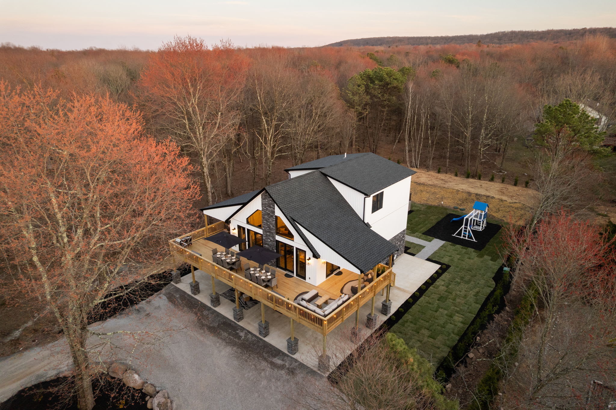 Aerial autumn view of the home tucked among the colorful Pocono treetops