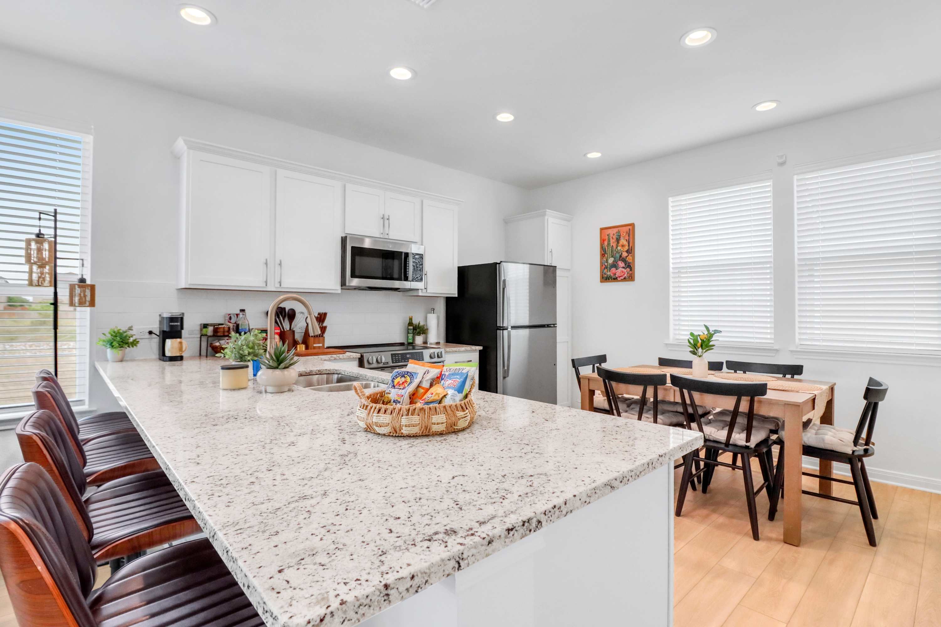 The chic, open kitchen is well equipped for an unforgettable getaway​