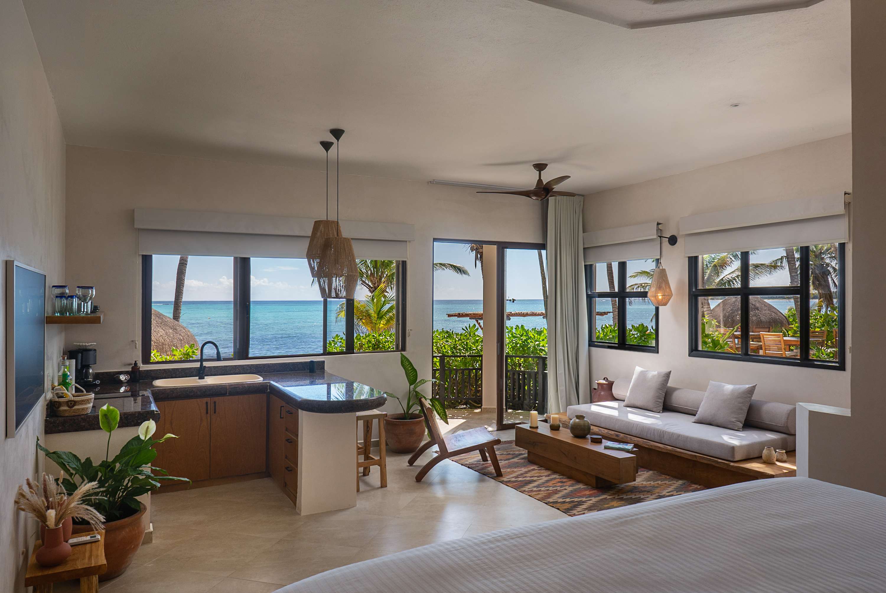 Living in a studio featuring a private kitchenette and an ocean view