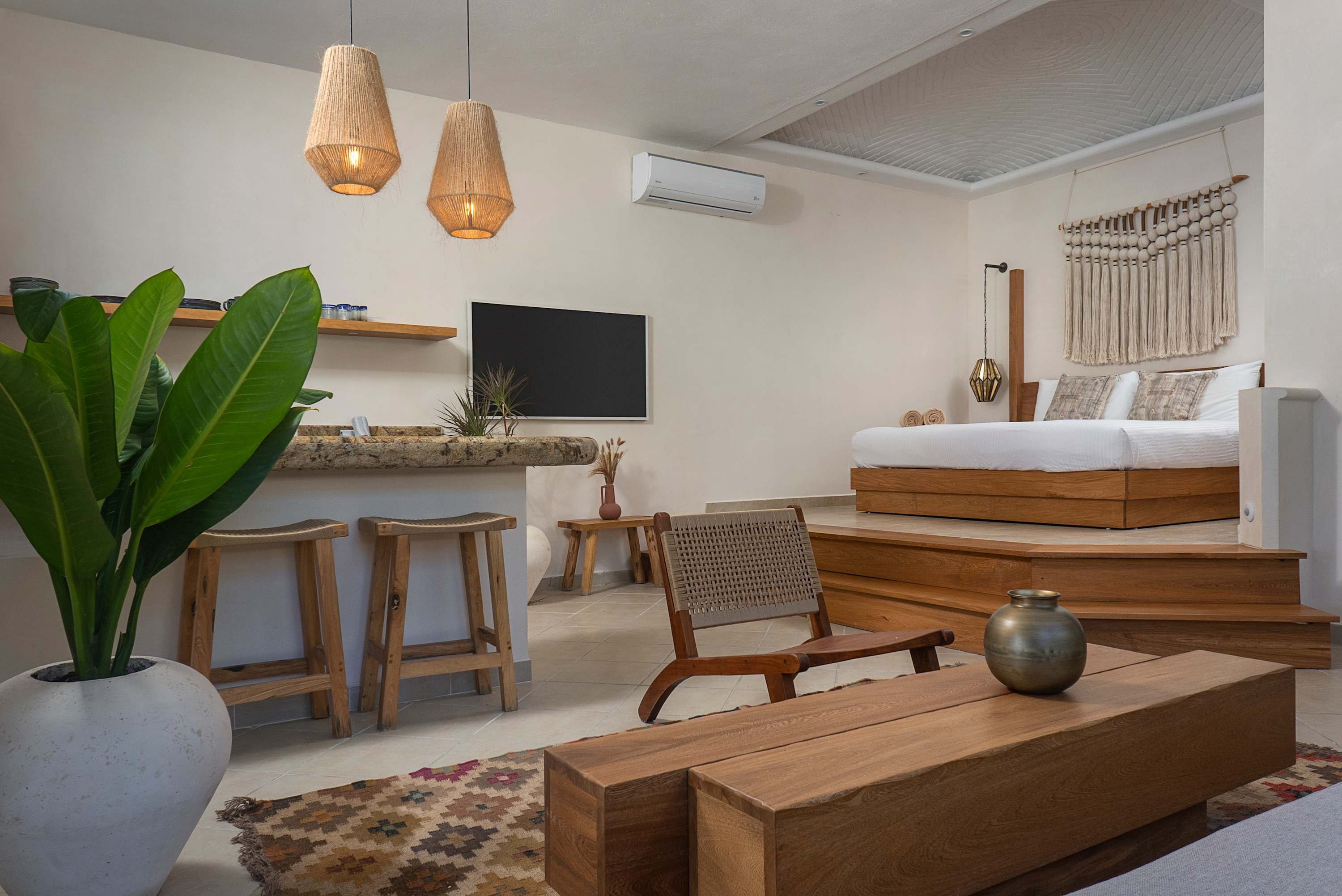 Living in a studio featuring a private kitchenette and an ocean view